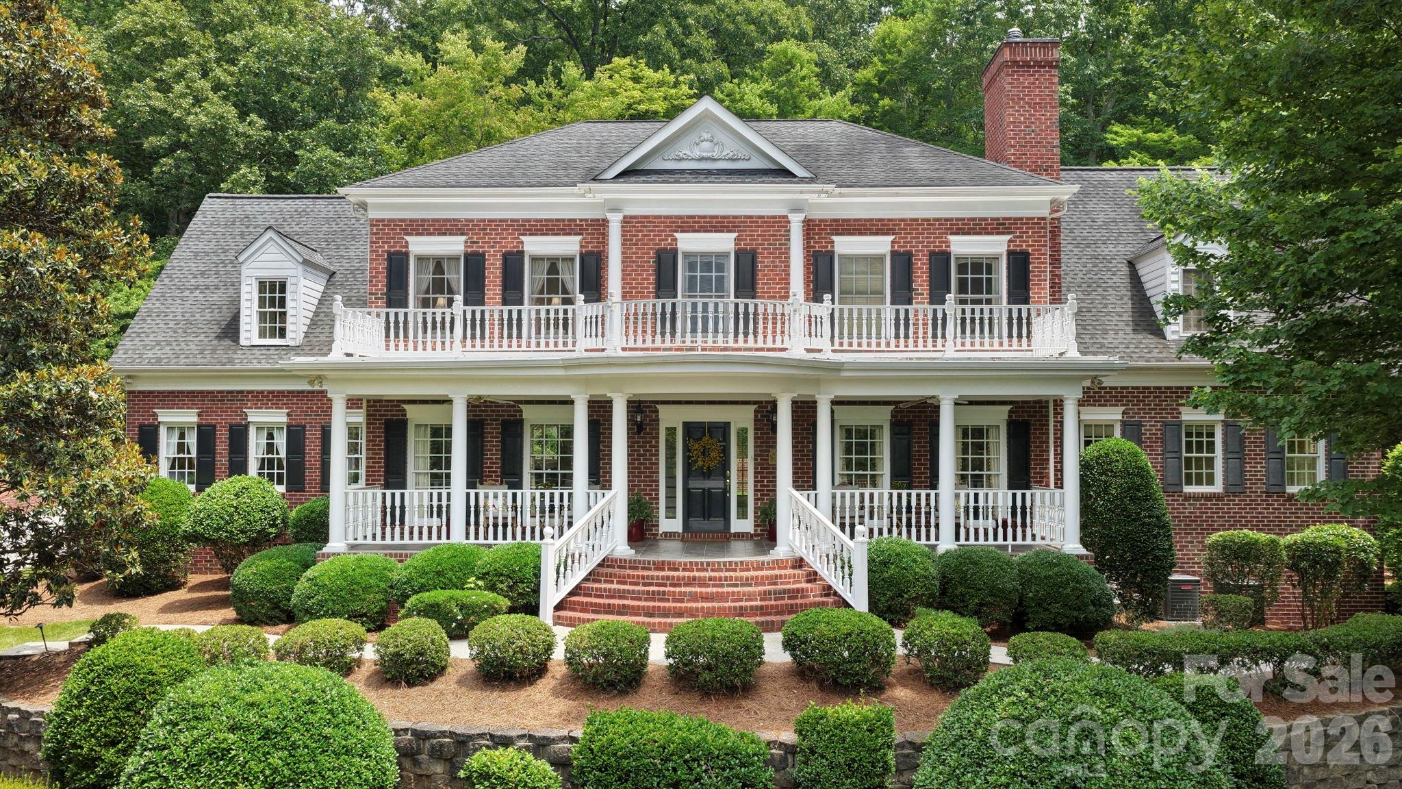 Situated on 3.41 acres within the gated Cramer Mountain community, this impressive all-brick estate offers an exceptional blend of privacy, luxury, and timeless design. This 4-bedroom residence features 4 full baths and 2 half baths thoughtfully designed for both everyday living and grand-scale entertaining.

A sweeping floor plan showcases spacious living areas, refined finishes, and seamless flow throughout. The home is highlighted by a dedicated wine room, caterer's prep area, and multiple spaces designed for hosting family and guests. The chefs kitchen has an iconic red AGA stove, wall oven, additional beverage fridge and coffee station.  The expansive primary suite provides a private retreat, dressing room and 4 closets!  The Rec room leads to walk in attic access. Generously sized secondary bedrooms all have en suite baths and walk in closets! 

Outdoor living is equally impressive with covered porches, mature landscaping and abundant privacy across the 3.41-acre homesite. With deer, rabbits and sounds of the fountain you'll find relaxing easy in your own slice of paradise.  Car enthusiasts and those needing additional parking will appreciate the oversized three-car garage and dual driveways, providing both convenience and functionality.

Located within one of Gaston County's premier gated golf course communities, residents enjoy a desirable location with convenient access to Belmont, Charlotte Douglas International Airport, and Uptown Charlotte. This exceptional property presents a rare opportunity to own a private estate in sought-after Cramer Mountain.