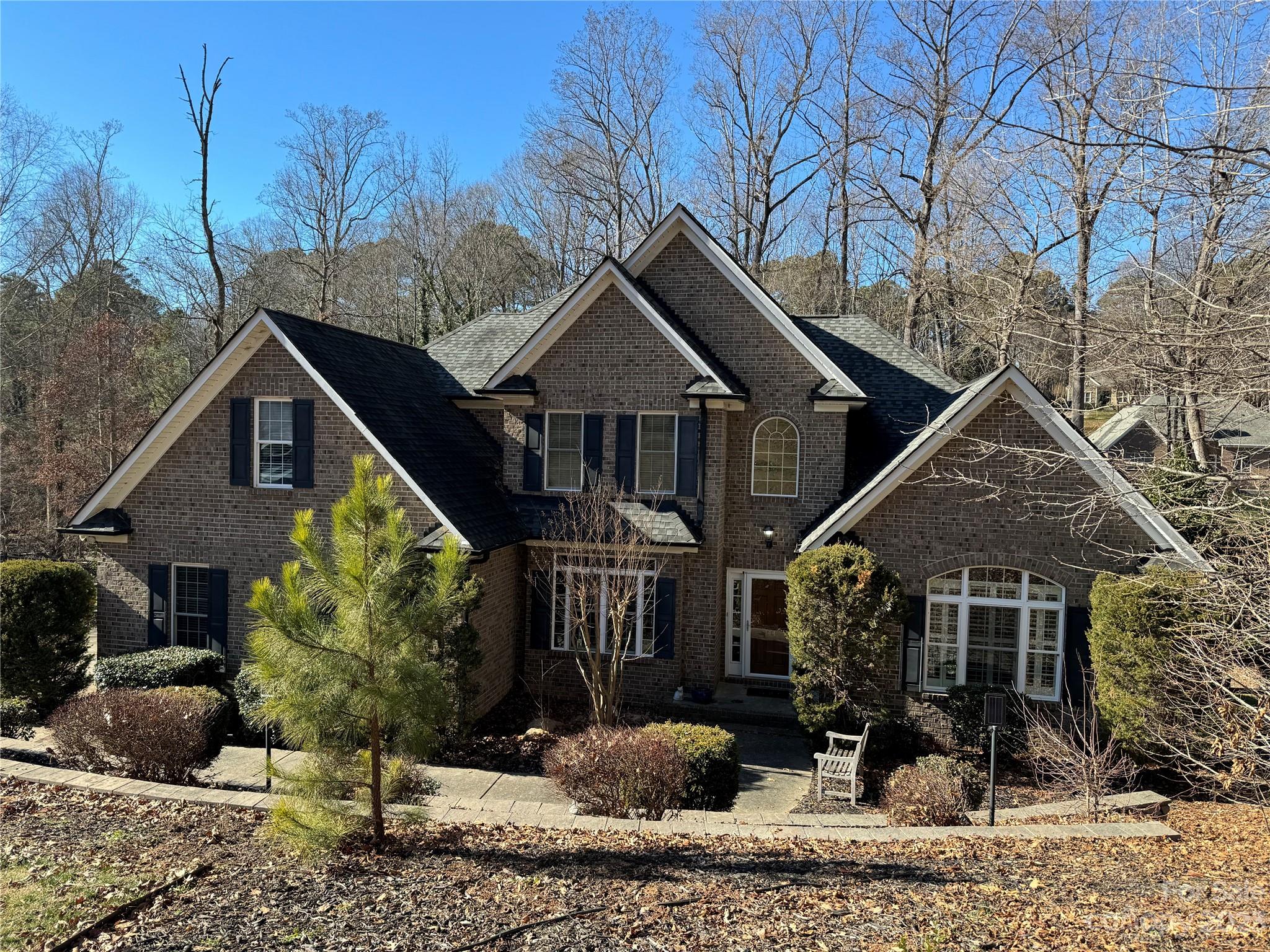 A terrific FULL Brick custom home privately tucked back from the cul de sac in the small Stonegate community. You’ll appreciate the home’s craftsmanship as you step into the foyer & notice the beautiful coffered ceilings in the Great Room just ahead. A welcoming formal dining room is just off the kitchen which features a walk-in pantry, granite countertops, tile backsplash & SS appliances including a Samsung Smart Family Hub refrigerator! Enjoy your morning coffee at the kitchen island or grab a seat at a table in the eat-in kitchen. The thoughtful design of the main level Primary Bedroom w/ en-suite bath is complimented by a large adjacent office that could easily work as a crafting room, playroom or convenient nursery close by. Upstairs has 2 large bedrooms, full bath, a loft area & a bonus room that could work as a 4th bedroom! Out back is a spacious screened porch that leads to a huge deck w/ 6+ person hot tub where you can overlook the fully fenced backyard. Photos load on 1/30/24