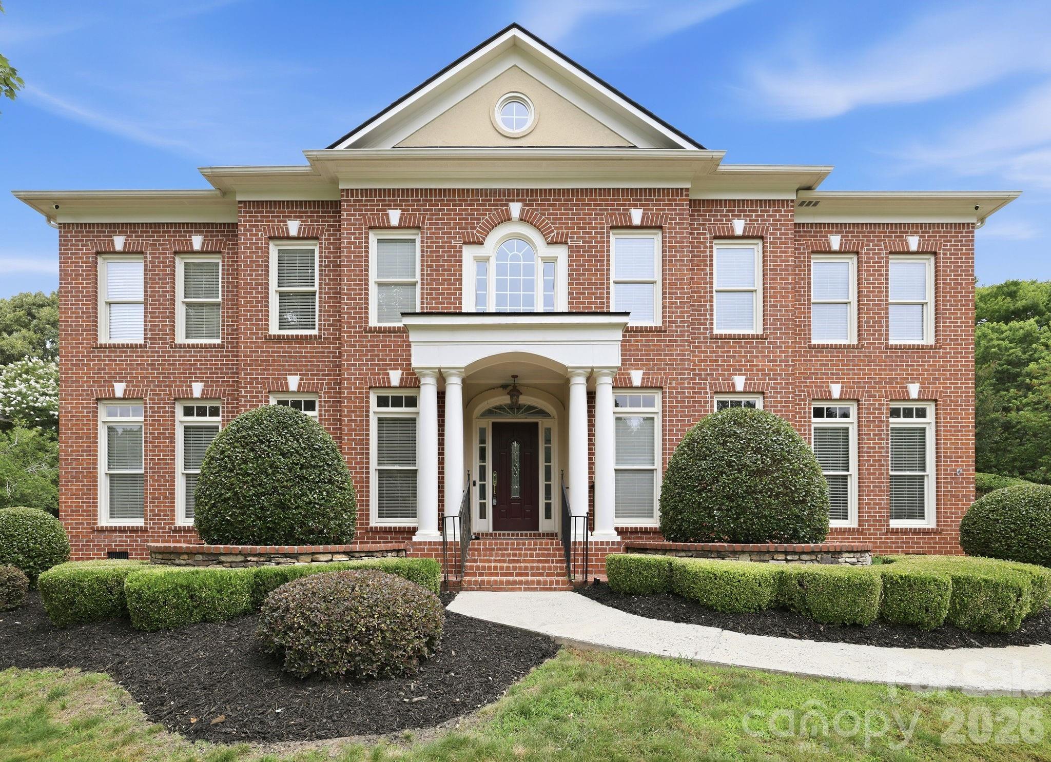 Welcome to 7818 Stonehaven Drive, a fully renovated, move-in ready masterpiece in prestigious Weddington Chase, zoned for top-rated Marvin Ridge schools. From the moment you arrive, the manicured landscaping and grand brick exterior set the tone for what awaits inside.

The heart of the home is the two-story great room featuring soaring ceilings, a wall of windows, a gas fireplace, and custom floor-to-ceiling built-ins that make an immediate statement. The fully upgraded kitchen showcases quartz countertops, a custom range hood, premium appliances, and a stunning brick backsplash, a space built for people who actually cook. Hardwood floors flow through every room on the main and upper levels. The remodeled primary suite delivers a spa-like escape with a freestanding soaking tub and frameless glass shower.

The third floor is a home within a home, featuring a full kitchenette, upgraded bath, and bonus room perfect for in-laws, guests, or a private retreat. Outside, unwind in the hot tub in your private, fully fenced backyard. The finished garage adds epoxy floors and a second washer/dryer hookup, a rare find for active families.

Resort-style community amenities including a clubhouse, pool, fitness center, and tennis courts. Nothing left to do but move in. Homes like this do not last.
