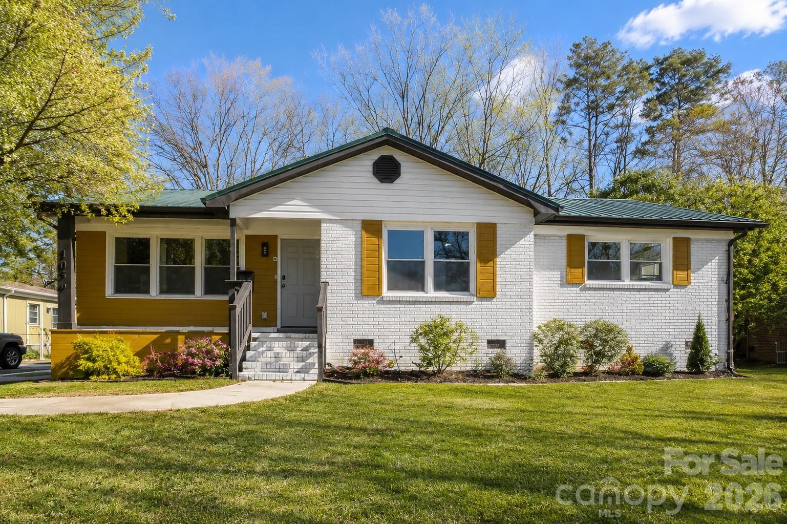 1036 Cutler Place offers the rare combination of thoughtful updates, timeless character, and an unbeatable Charlotte location. Tucked into the heart of Amity Gardens, this home is just minutes from Plaza Midwood, NoDa, and Uptown, while still offering the comfort and privacy of an established neighborhood setting.
Inside, natural light pours through the home, creating a warm and inviting atmosphere from the moment you walk in. The open living, dining, and kitchen spaces flow effortlessly together, making everyday living feel comfortable and connected while also giving the home an easy entertaining feel. The kitchen offers generous storage and workspace, perfectly positioned at the center of the home where conversations and gatherings naturally happen.
The primary suite provides a peaceful retreat, while the additional bedrooms offer flexibility for guests, a home office, or changing lifestyle needs. Outside, the private backyard creates the perfect setting for morning coffee, evenings with friends, or simply unwinding after a long day.
Beyond the aesthetic appeal, this home stands out because the major work has already been done for you. A 2024 metal roof, 2019 HVAC system, new windows, updated plumbing, and an encapsulated crawlspace provide a level of comfort and confidence that is increasingly hard to find in this price range.
1036 Cutler Place blends modern updates with everyday comfort in one of Charlotte’s most connected and rapidly growing areas.