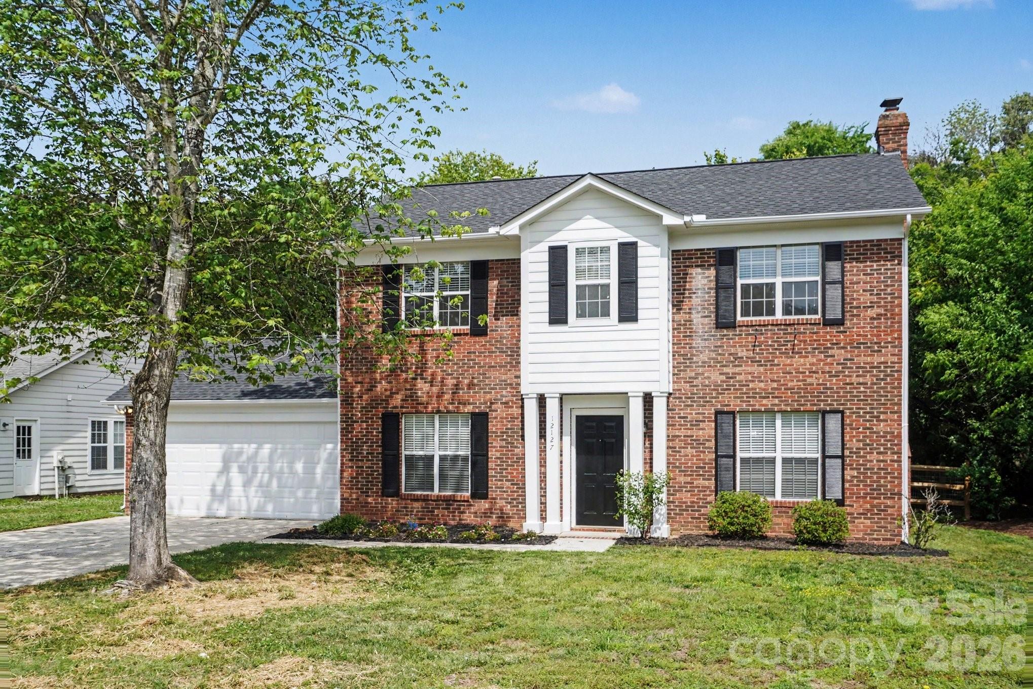 This 3-bedroom, 2.5-bathroom two-story home combines classic charm with a highly functional layout. The main level features a large great room centered around a cozy fireplace, perfect for relaxing or entertaining. Upstairs, you’ll find the spacious primary suite, which serves as a true retreat with its own private bath featuring a relaxing garden tub.

The exterior is just as inviting, boasting a large private backyard that offers plenty of space for gardening, play, or outdoor dining. Its location is a major standout—conveniently located near I-485, providing quick and easy access to the greater metropolitan area, shopping, and dining.