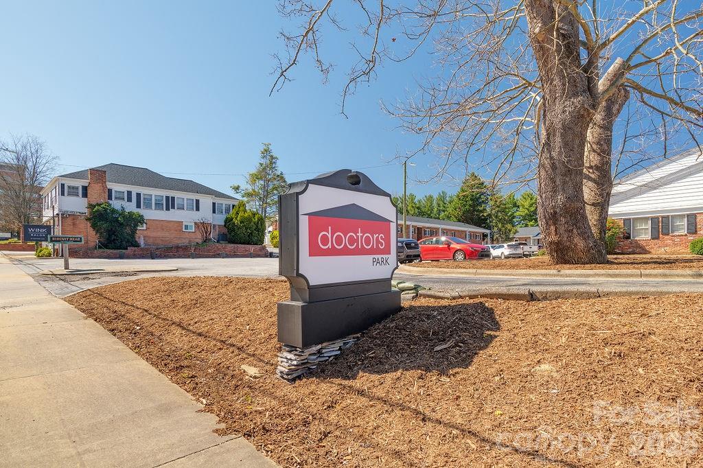 Great Investment Opportunity!  Fully leased, highly desirable, professional office space in the heart of the medical district in downtown Asheville CNC. This unit has 7 individual offices rented by counselors and therapists. Completely updated and remodeled and in excellent condition. 

Located in downtown Asheville NC in Doctor’s Park, near Mission Hospital.  "Doctors Park is a 5.5 acre business office park near downtown Asheville off Biltmore Ave close to Mission Hospitals. Each condo unit is individually owned and operated. This second-floor unit has been designed with privacy and comfort in mind to support its tenants and their clients.  Plenty of parking for clients and tenants.

This second-floor office suite includes a generous waiting room area, 2 bathrooms, and a break room to support the 7 individual offices. Offices have built-in bookshelves and desks. Owners have done upgrades of over $50,000 to include new HVAC, carpet and paint, built in bookshelves and desks in some offices, and updated bathrooms.
Waiting room furniture conveys.  Wall art does not. 

The POA is managed by Doctors Park Association. doctorsparkavl@gmail.com . Mailing address: 5 Doctors Park Ste B, Asheville NC 28801.  POA covers electric, water, property management including landscaping and snow removal, trash/recycling removal, exterior monthly pest control by Terminix, and insurance on the exterior building structure. It has updated the park with over $270000 in underground plumbing updates and new roofs in the past few years.   For more information https://www.doctorsparkavl.com/faqs.