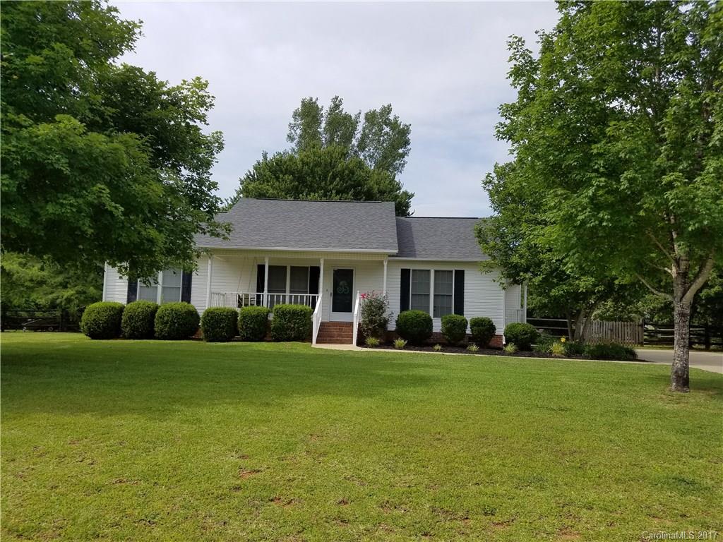 The house you've been searching for is right here! Come make this very charming & beautiful 3 bedroom 2 bathroom home your oasis! This home sits on a sizable 1 acre lot that boasts a beautiful fenced backyard that contains an assortment of fruit trees. Settle into a home with an open floor plan, updated bathrooms, & hardwood floors throughout. Enjoy your evenings relaxing on the front porch and taking in the serenity of a quiet and very desired, well-established neighborhood! Come see today!