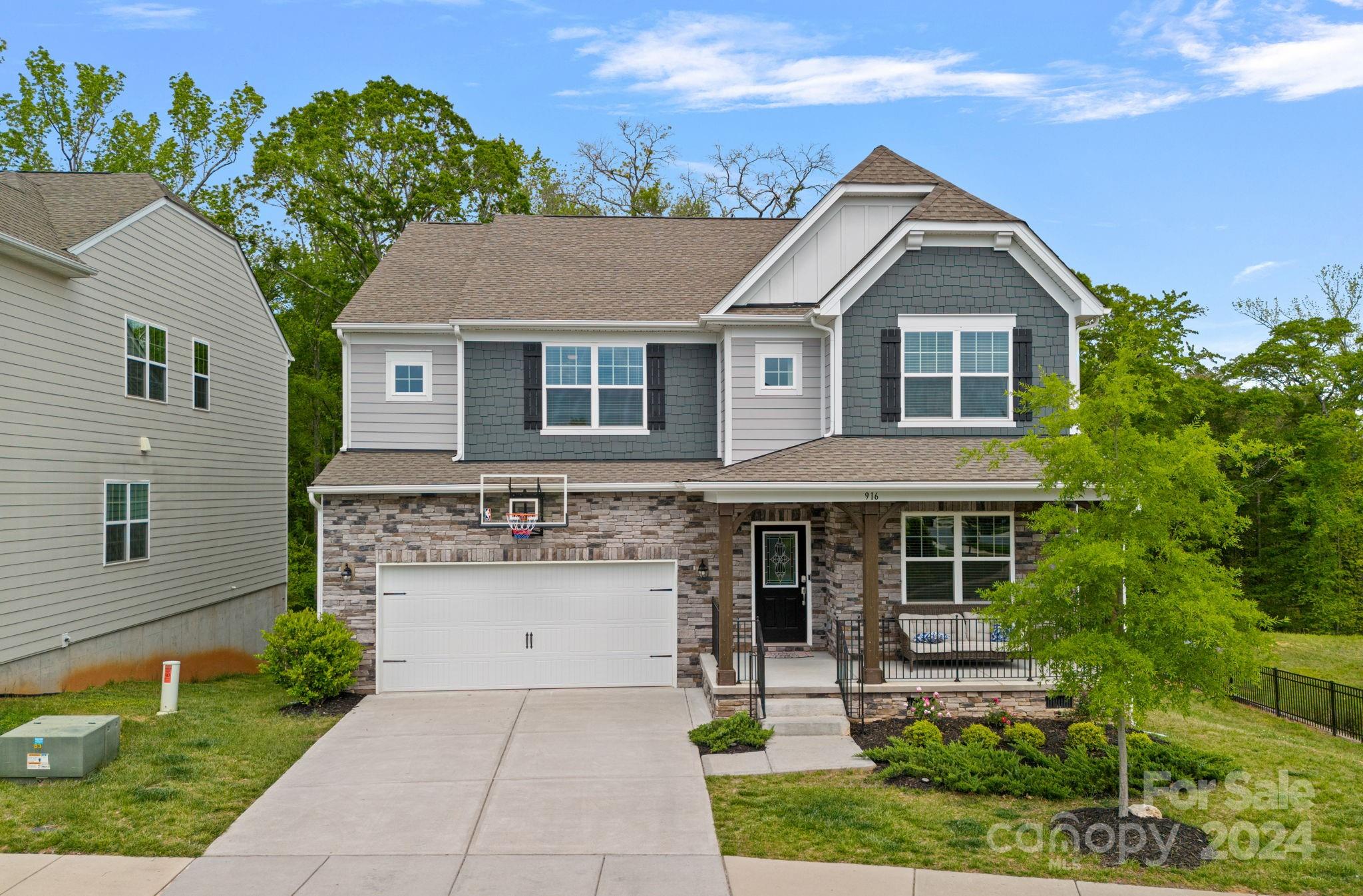 Beautiful like-new Fort Mill dream home has everything you need and more in Oakland Pointe. This 5 Bed- 4 ½ Bath home offers an outstanding open layout with a guest bedroom & bath along with an office on the first floor. The gourmet kitchen features quartz counters & subway tile backsplash, the island is detailed with 3 pendant lights and opens to a great room with a built-in gas fireplace. Hardwood floors cover the main level with ample natural light. The wrought iron stair railing brings you to the oversized loft & large owner's suite with 3 more spacious bedrooms & 2 full baths. All new upgraded carpets and premium waterproof pads have been updated along with a modern-looking LVP on the stairs and loft. The backyard offers a nice deck with privacy along with a brick patio and built-in grill.  Proximity to historic downtown Fort Mill, the  including a pool, desirable Fort Mill schools, Anne Springs Greenway & easy commute to Uptown Charlotte. It's time to call this place HOME!