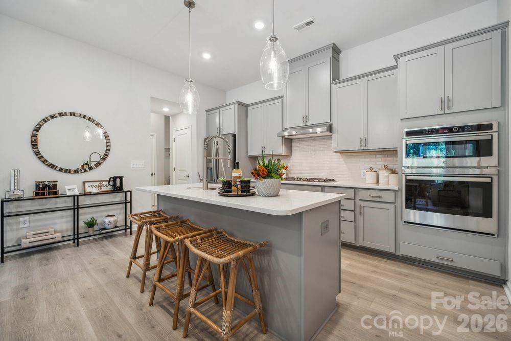 What's Special: 1st Floor Guest Suite | Oversized Garage | 2nd Floor Laundry Room | West Facing Lot. New Construction - September Completion! Built by America's Most Trusted Home Builder. Welcome to the Telluride at 3185 Beacon Heights Road in Ridge at Sugar Creek! This thoughtfully designed two-story townhome features a bright, open-concept main floor filled with natural light, where the great room flows seamlessly into the kitchen and casual dining area for effortless everyday living and entertaining. At the front of the home, a private guest suite with its own full bathroom offers comfort and convenience. Upstairs, an inviting loft at the top of the stairs provides flexible living space ideal for relaxing or gathering. The primary suite is tucked along the back of the home for added privacy, complete with a spacious bath featuring dual sinks, a shower, and an oversized walk-in closet. Two secondary bedrooms and a shared full bathroom are located at the front of the second floor, along with a conveniently placed laundry room for added functionality. Pool and cabana now open! Ridge at Sugar Creek in Indian Land, SC, offers a welcoming lifestyle with a new pool and planned greenway trail. Just 4.5 miles from Ballantyne, you’ll enjoy easy access to I-77, I-485, and the Ballantyne Bowl’s dining and events. Commuting is simple with quick routes to Uptown Charlotte and Ballantyne Corporate Park. Photos are for representative purposes only. MLS#4401934