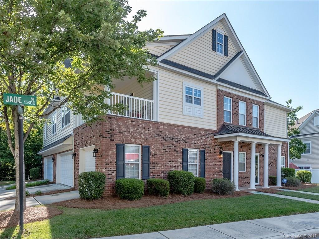 Location, location, location! Move in ready, 2 Bed, 2 Bath Ballantyne Condo. Newer paint and refinished
hardwoods. Enjoy time relaxing on the tiled covered porch/balcony. Hardwoods in main living area. Vaulted
Ceilings and Gas Fireplace in Great Room. Open kitchen with 42" cabinets, island, granite counter tops and
tumbled stone tile backsplash. SS Appliances. Tray Ceilings in Master Bedroom with Dual Vanity in Master Bath. End unit with attached 1 car garage. Home Warranty Provided.