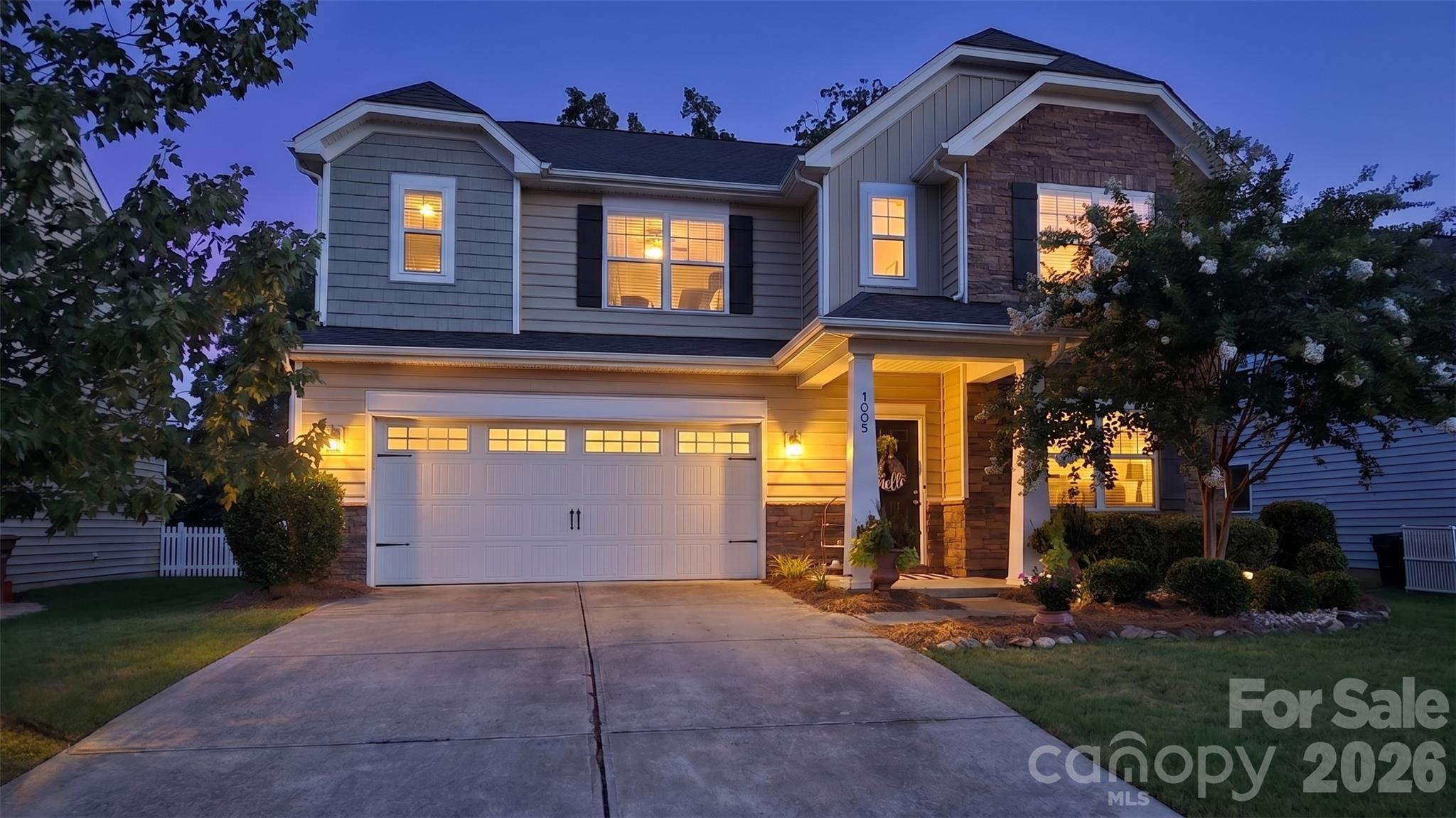 Welcome home to 1005 Wainscott Drive, where space, flexibility, and an amenity-rich lifestyle come together in Waxhaw’s desirable Lawson community. Built in 2013, this spacious home offers 2,897 square feet of finished living space, 5 bedrooms, a dedicated office, and 3 full baths with a versatile floor plan designed for the way you live, work, gather, and unwind. Just inside the front entrance, the dedicated office provides a convenient and private work-from-home space without sacrificing a bedroom. A first-floor guest bedroom and full bath offer an ideal arrangement for overnight guests or multigenerational living. The kitchen features stainless steel appliances and opens to comfortable gathering spaces designed for everyday living and entertaining. Upstairs, the spacious owner’s suite offers a relaxing retreat with a private bath featuring a garden tub, while the additional bedrooms provide plenty of room for family, guests, hobbies, or flexible living needs. Step outside and enjoy the possibilities of the fenced backyard—perfect for pets, play, gardening, outdoor dining, entertaining, or simply relaxing at home. The 440-square-foot garage provides convenient parking and additional storage space. Beyond the home, the Lawson lifestyle is one of its greatest attractions, offering community pools, miles of walking and nature trails, fitness and recreation amenities, tennis courts, parks, playgrounds, and inviting community spaces that make it easy to stay active, enjoy the outdoors, and connect with neighbors. Start the morning with a walk along the trails, spend summer afternoons by the pool, work from the comfort of your dedicated home office, enjoy evenings in the fenced backyard, or explore the shopping, dining, recreation, and small-town charm of Waxhaw. Located in one of Union County’s most sought-after residential areas and served by Union County Public Schools, this home combines a desirable Waxhaw location with convenient access to shopping, dining, recreation, and community amenities. With nearly 2,900 square feet of finished living space, five true bedrooms, a dedicated office, main-level guest accommodations, three full baths, stainless steel appliances, a fenced backyard, and access to Lawson’s extensive amenities, 1005 Wainscott Drive offers the space to live comfortably and the community lifestyle you’ve been looking for. Buyer to verify current school assignments.