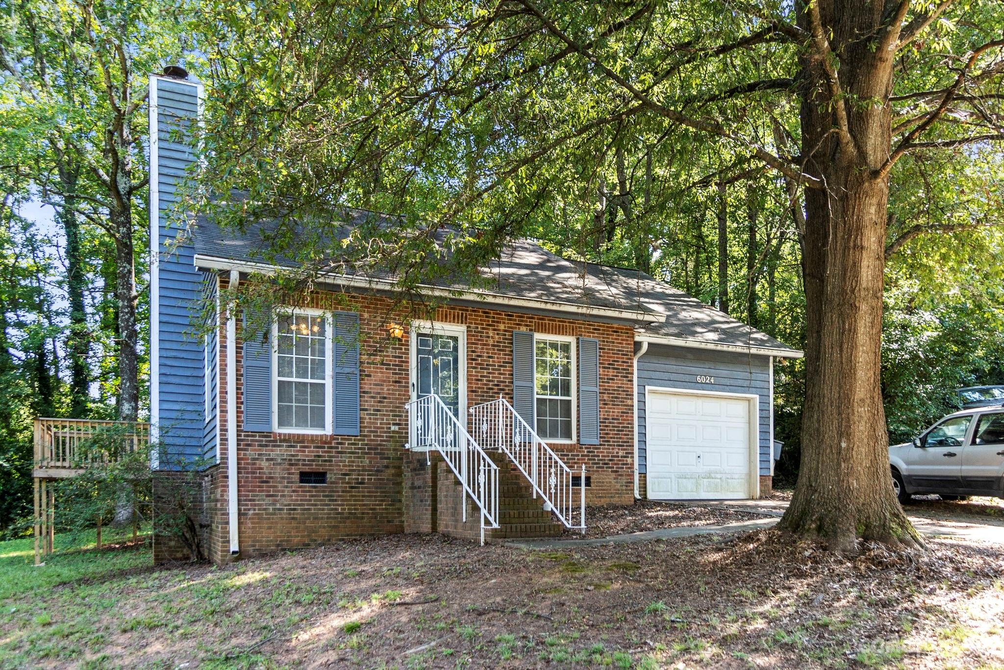 NO HOA!! Welcome to 6024 Crosswood Ct. This serene cul-de-sac home in the heart of Charlotte boasts a one-car garage. Nestled in lush greenery, it's filled with natural light, creating a warm ambiance. The living area is ideal for relaxation and two spacious bedrooms offer comfort. The one-car garage provides parking or storage. Centrally located, you'll have easy access to shopping and dining in Noda and Plaza Midwood. Only 6 miles from UNC Charlotte.  Don't miss out!