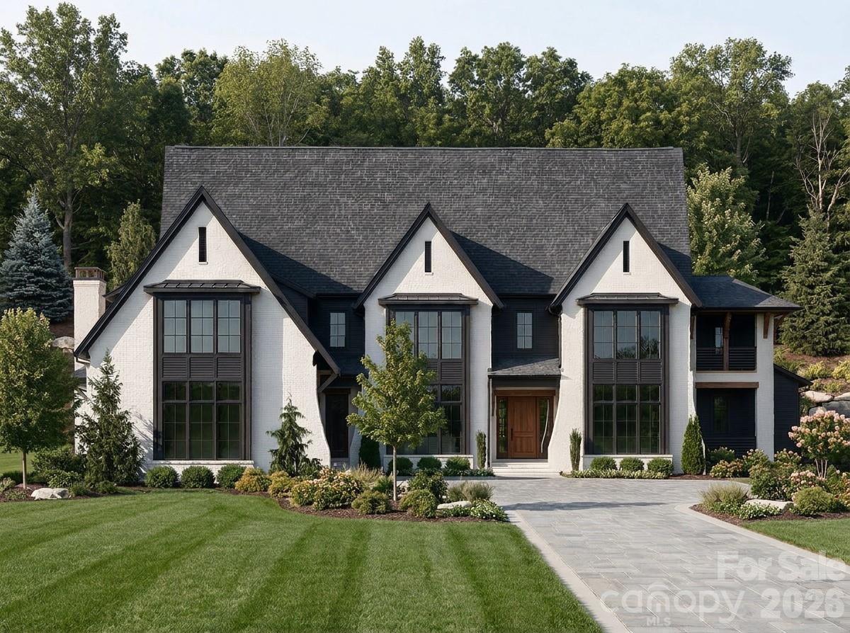 Experience elevated modern living in Sage at Marvin, an exclusive enclave by Peters Custom Homes. Surrounded by serene landscapes, this architecturally striking home showcases clean, elegant lines, curated designer finishes, and exceptional craftsmanship throughout.

Designed for both everyday comfort and effortless entertaining, the open-concept main level features a stunning great room, expansive gourmet kitchen with oversized island, walk-in pantry, and a fully equipped scullery for seamless hosting. The adjoining family dining area opens to a spacious covered porch, creating the perfect indoor-outdoor lifestyle. A private study/music room, guest suite with full bath, and convenient main-level elevator access enhance functionality and flexibility.

The luxurious primary suite offers a true retreat with a spa-inspired bath, generous walk-in closet, and direct access to a private sitting area. Thoughtfully designed secondary spaces—including a drop zone, upper level laundry room, and multiple storage areas—add everyday convenience.

Upstairs, you’ll find well-appointed secondary bedrooms, additional baths, and exceptional bonus spaces including a billiards room, media/lounge area, and flexible living spaces ideal for work or play. A second covered porch and ample walk-in storage complete the upper level.

Every detail reflects Peters Custom Homes’ commitment to superior materials, precision construction, and timeless design.

Located in the highly sought-after Marvin school district, Sage at Marvin offers both tranquility and convenience—just minutes from premier shopping, dining, and entertainment at Blakeney, Waverly, and Ballantyne, along with nearby parks and recreation.

A rare opportunity to own a meticulously crafted home that perfectly balances luxury, functionality, and location.