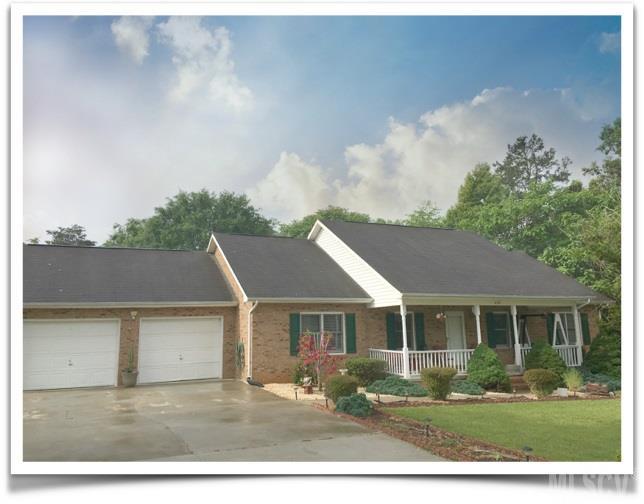 If you are seeking a beautiful home in Granite Falls with no city taxes, you have found it!  This home was constructed by a builder who previously lived in the home.  It features updated granite kitchen counter tops, an updated stainless steel sink and faucet with a tile kitchen floor.  There is hardwood flooring in the great room and hallway.  The master bedroom includes a master bath with dual sinks.  The main bathroom has a shower and jacuzzi tub.  There is a double garage on the main floor and a single garage in the basement, spacious enough for yard equipment.   The sliding glass door to the deck has enclosed blinds.   There is a spacious backyard which is enclosed by a fence; however, the backyard actually extends almost to the road behind the home and is wooded for your enjoyment.   Come take a look before it's too late!