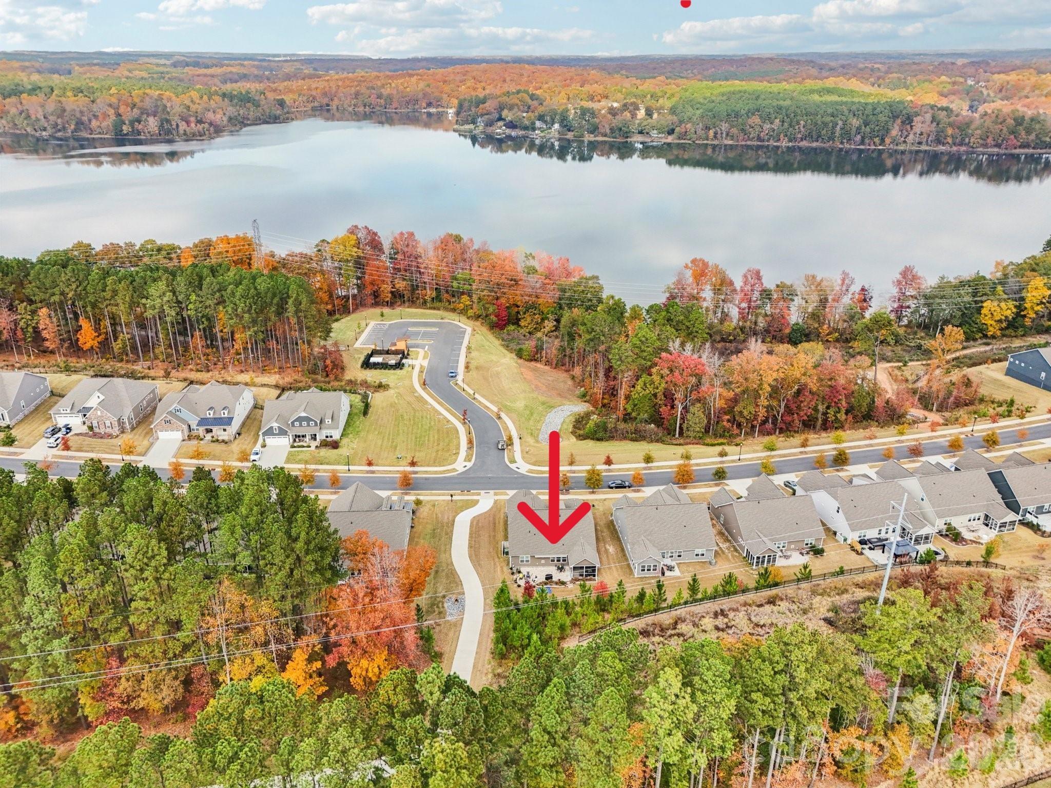 ******PRICE RECUCTION******

BOAT DOCKS FOR THE MARINA ARE NEAR COMPLETION! SLIPS TO BE LEASED ANNUALLY. 

This beautifully updated 3BR, 2.5-bath home in vibrant “Imagery on Mt Island Lake” has seasonal water views from the rocking chair front porch and is just steps away from the future marina!
This one level Elmont model on a corner lot will truly become your forever home.

Thoughtful upgrades create a turnkey living experience. The entire house features upgraded luxury vinyl plank flooring providing a cohesive, low-maintenance foundation throughout. Designer window treatments adorn every room, and remote shades add convenience and privacy in the guest room and dining area.

The heart of the home shows exceptional attention to storage and style: a custom kitchen storage system and designer lighting in both the kitchen and dining area make daily living and entertaining effortless. Features include upgraded double wall ovens and a sizeable, pristine quartz countertop.  The primary ensuite includes a custom closet organizer with built-in drawers to keep belongings neat and accessible.  Two additional spaces can flex as guest rooms or serve as an office. The spacious laundry room features a utility sink. There is also Instant hot water at every sink!

The screened-in porch includes a ceiling fan plus privacy sunshades for relaxing outdoors while taking in the beautifully landscaped yard - an entertainer’s dream with a large paver patio, built-in planters, and a sitting wall surrounded by thoughtful landscaping that enhances privacy.  The remote-controlled awning stretches out over the patio for ease and comfort.

Imagery residents enjoy front and back lawn maintenance and the use of outstanding amenities cabins featuring a well-appointed library, textile/art studio, pottery studio and dog park. Care to be a little more active? Take a dip in the heated resort style pool open from May through October! Try your hand at pickle-ball/tennis on lighted courts! The fitness center offers free weights, exercise equipment and a separate studio for yoga, Pilates and even Zumba! Walk the wooded trails to enjoy nature lake-side! There are also over 50 interest clubs in this vibrant community!