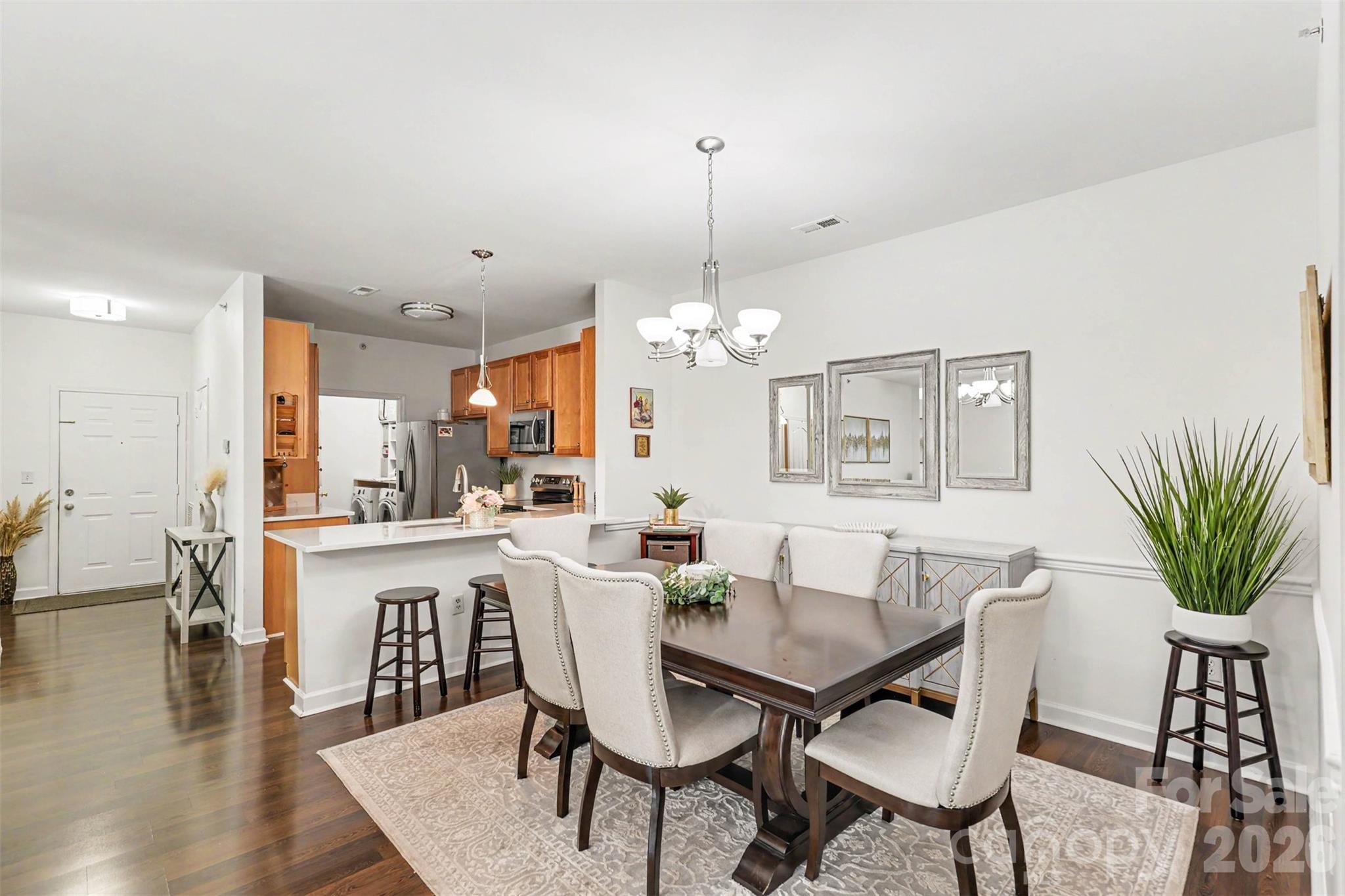 Discover low-maintenance living in the sought-after Copper Ridge community with this thoughtfully refreshed, move-in-ready condominium in the heart of the Ballantyne area. Designed with an inviting, open layout, the home offers comfortable everyday living paired with tasteful updates that make it easy to enjoy from day one. Fresh improvements include a beautifully updated bathroom, a custom-designed organization system in the spacious primary walk-in closet, and major mechanical upgrades featuring a 2023 HVAC system, furnace, and water heater, providing added value and peace of mind.

Natural light fills the main living spaces, creating a bright, welcoming atmosphere that flows seamlessly into the kitchen and dining area—ideal for entertaining, remote work, or everyday living. In addition to the two bedrooms, the versatile office/flex room offers exceptional adaptability and can easily function as a third bedroom, home office, fitness room, hobby space, or media room to suit a variety of lifestyles. The spacious primary suite provides a relaxing retreat complete with an updated bathroom and large walk-in closet to maximize storage.

Step outside to enjoy a private outdoor space or take advantage of Copper Ridge's exceptional community amenities, including a clubhouse, outdoor swimming pool, tennis courts, and picnic area, providing plenty of opportunities to unwind or stay active close to home.

Ideally positioned along Highway 521 between Marvin Road and Ardrey Kell Road, this location places you just minutes from Ballantyne's extensive selection of shopping, restaurants, grocery stores, entertainment, fitness centers, medical facilities, and daily conveniences. Quick access to I-485 and nearby South Carolina destinations adds even greater flexibility for commuting and recreation.