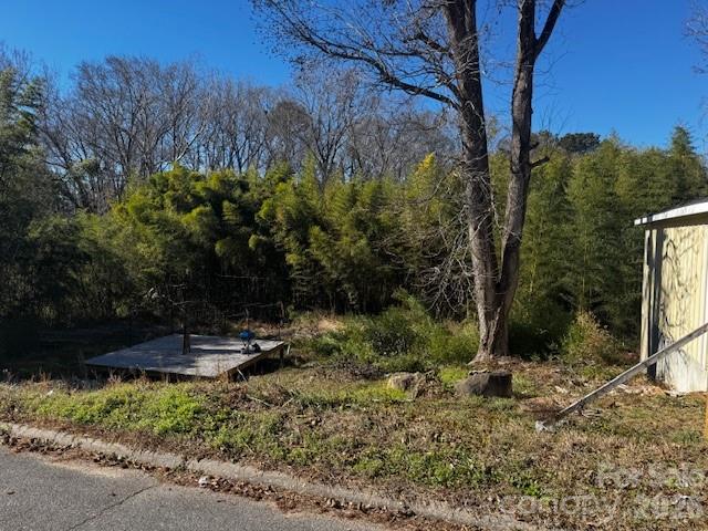 Nice lot ready to built a home--Living in Great Falls, SC, offers a quiet, close-knit, and affordable small-town lifestyle, perfect for those seeking a peaceful, artistic community with expanding outdoor recreation. Residents benefit from scenic natural surroundings, including new kayak and canoe access points, while enjoying a relaxed atmosphere.Here is why you might want to live in Great Falls, SC:
Growing Outdoor Recreation: The town is actively developing its natural assets, including new waterways for kayaking and canoeing, offering scenic spots to enjoy nature.
Small-Town Charm & Quiet Living: Great Falls is a very small town, allowing for a tight-knit community feel without the noise and bustle of a larger city.
Artistic Community: Great Falls has a higher concentration of artists, designers, and media workers than 90% of communities in the US, making it a unique spot for creative individuals.
Affordable Cost of Living: As part of South Carolina, the town offers a lower cost of living compared to the national average, making it an affordable place to call home.
Strategic Location: Located in Chester County, it provides a quiet environment while still being within reach of larger metropolitan areas for added convenience.
Active Local Involvement: The community is very involved in local recreational sports, fostering a strong sense of community. 
For someone looking to escape the hustle of city life and be part of a rejuvenating, nature-focused community, Great Falls offers a distinct, scenic, and affordable options.