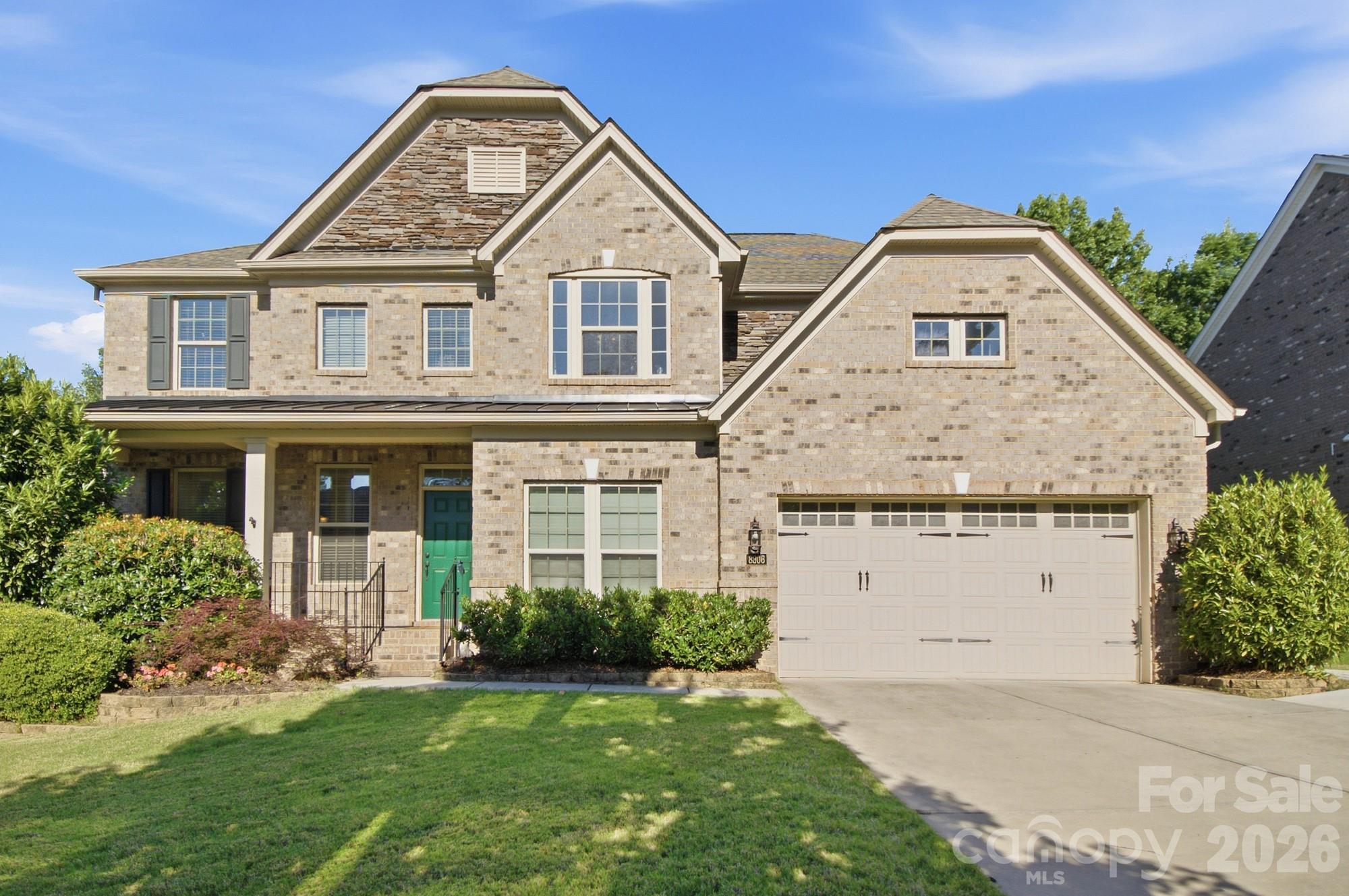 Beautifully maintained full-brick home offering timeless style, generous living spaces, and a thoughtfully designed layout in a peaceful, tree-lined setting. From the moment you arrive, the home's curb appeal, manicured landscaping, and welcoming covered entry create a warm first impression.

Inside, you'll find elegant details throughout including hardwood floors, extensive trim work, coffered ceilings, tray ceilings, archways, and wrought iron staircase balusters that add character and sophistication. The formal dining room features classic wainscoting and abundant natural light, creating the perfect space for hosting gatherings and holiday dinners.

The heart of the home is the spacious open-concept kitchen and living area designed for both everyday comfort and entertaining. The gourmet kitchen features rich cabinetry, granite countertops, stainless steel appliances, a built-in double oven, gas cooktop, oversized center island, with seating, and a bright breakfast are overlooking the backyard. The adjoining living room is filled with natural light from oversized windows, hardwood floors, and plenty of room, creating an inviting atmosphere throughout the main level.

Upstairs, the spacious primary suite offers a relaxing retreat complete with elegant tray ceilings, large windows, dual walk-in closets, and a luxurious ensuite bath featuring dual granite vanities, a tiled walk-in shower with glass enclosure, and a garden tub. Secondary bedrooms are generously sized, including convenient Jack-and-Jill bathroom access with dual vanities and a separate private tub and toilet area designed for functionality and privacy.

The finished bonus room over the garage provides exceptional flexibility and can easily function as a media room, playroom, fitness space, home office, or additional living area depending on your needs. 

Step outside to enjoy the low-maintenance composite deck, ideal for grilling, outdoor dining, or simply relaxing while overlooking the private backyard. Mature landscaping and a wooded backdrop create a peaceful outdoor setting with space to entertain, play, or unwind.

Additional highlights include:
-A spacious two-car garage with extra workshop and storage space 
-Abundant natural light throughout the home
_A floor plan that blends elegance with everyday practicality
-Refreshed paint in common areas
-Full brick with professionally installed hardscaping in the backyard
-New (2024) composite deck with gas hook-up and lower level deck expansion
-Expanded driveway
-Beautiful community with wooded walking paths, community pond, and a convenient location to neighborhood amenities. 

This home offers the perfect balance of comfort, functionality, and classic design in a beautiful setting.