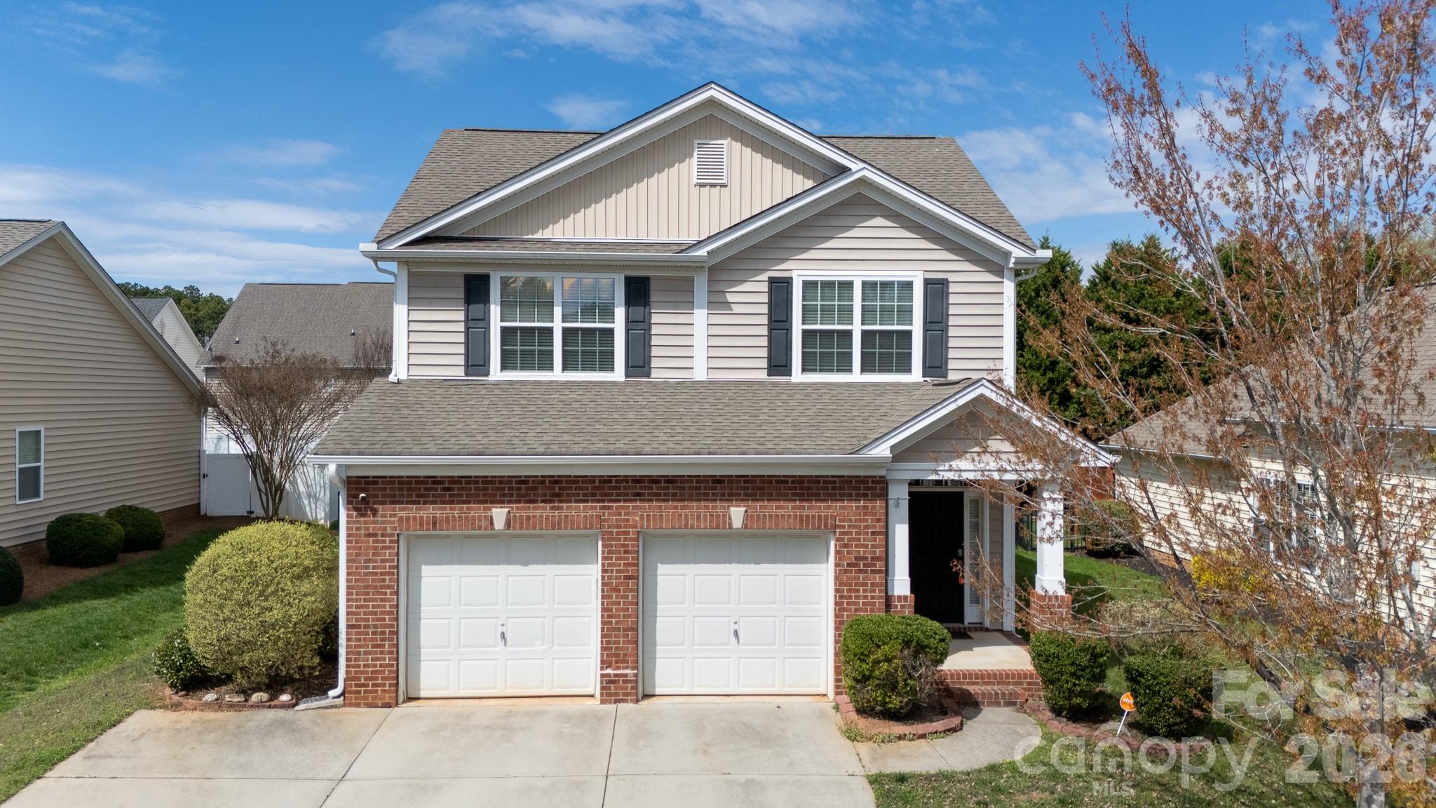 Imagine coming home to a life of ease in the heart of Millwood Plantation. This charming 4-bedroom home offers an inviting open floorplan highlighted by warm hardwoods throughout the main living areas, perfect for both quiet evenings and lively gatherings. The heart of the home features a well-appointed kitchen with stainless steel appliances, a functional work island, and a pantry to keep everything organized. Retreat to your main-level primary suite, a private sanctuary complete with elegant tray ceilings and a spa-like bath featuring a garden tub, separate shower, and dual sinks. Upstairs, a versatile loft provides the perfect space for a playroom, media center, or home office. Enjoy your morning coffee or a sunset view from the sunroom overlooking a fully fenced backyard. Beyond your doorstep, you are just minutes from premium shopping, dining, fitness centers, and medical facilities. With neighborhood amenities like a splash pad, playground, and scenic sidewalks, this home isn't just a place to live—it's a lifestyle upgrade.