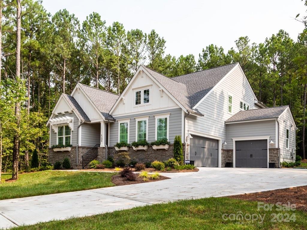 Classic American Cottage Covina is located in Riverchase Estates, Lancaster, SC, a true escape to nature with access to epic resort lifestyle. Riverchase Estates is centrally located minutes from shopping & dining in Indian Land, Rock Hill. Fort Mill & Waxhaw. Built by Classica Homes, Charlotte’s locally owned, nationally recognized luxury homebuilder, this home has served as the Classica Show Home in Riverchase Estates for several years. Carefully constructed & meticulously maintained, this home has never been lived in. Enjoy fine finishes, beautiful trim details, plantation shutters & more in this Show Home. Secure this Classica custom-built home on a mature, beautifully landscaped .76 acre homesite without the wait time to build. Available to be closed & occupied after 10/31/2024, or can be closed earlier with a lucrative leaseback arrangement & 10/31/2024 move-in. See attachment for Turnover, Warranty & Leaseback information.