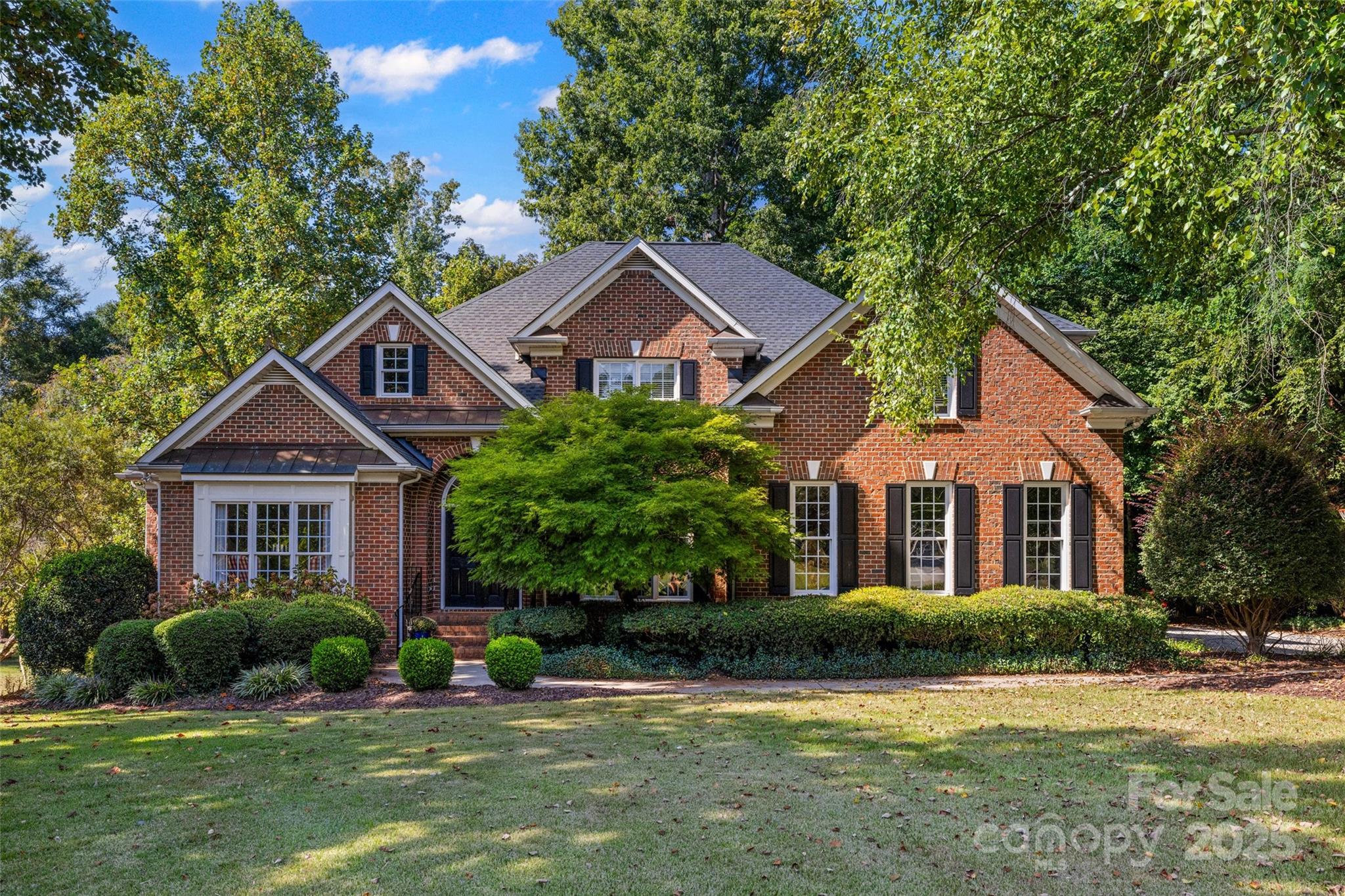 Welcome to this exquisite Meadow Lakes residence, where luxury and comfort converge. This stunning home has been meticulously updated and features a seamless, open floor plan with gleaming hardwood floors throughout. An abundance of windows bathes the entire home in natural light, creating a bright and inviting atmosphere.
The heart of the home is the recently remodeled, state-of-the-art kitchen, a chef's dream with a massive island, perfect for both meal prep and casual dining. The kitchen flows effortlessly into the spacious breakfast and dining areas. The great room offers a beautiful view of the backyard, complete with a cozy fireplace, built-ins, and elegant crown molding. The home also includes a formal dining and living room, perfect for entertaining. The main level is home to the serene primary suite, featuring a tray ceiling, a luxurious en-suite bathroom with an oversized dual vanity, walk-in shower, a garden tub, and a spacious walk-in closet. Upstairs, you'll find three additional bedrooms, two full bathrooms, and an expansive bonus room, providing ample space for family and guests.The best part of this home is the private .55 acre lot. The expansive grounds are perfect for entertaining and hosting large parties or get-togethers, A screened-in porch with its own wood burning fireplace offers the perfect retreat to unwind. Recent upgrades include new plumbing, HVAC duct work, vapor barrier, dehumidifier and a new roof. This exceptional property is located in a highly desirable community with a clubhouse, community pool, and tennis courts.