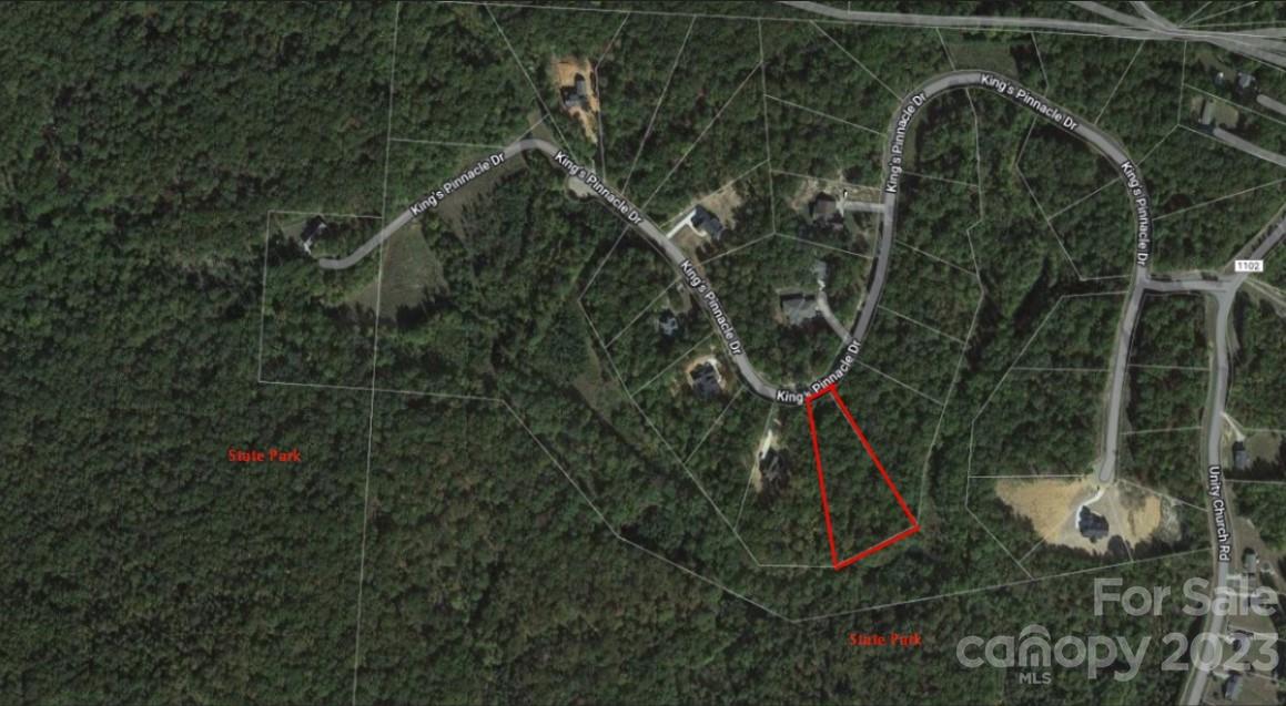 1.75 acre nice wooded lot in the beautiful, secluded, expansive Kings Pinnacle Subdivision with all custom built homes. If you come to visit this subdivision, most likely you will love it! It is is only 6 miles or 8 minutes to the new Catawba Two Kings Casino. It is one of the best lot in the subdivision. Do not let it go.  Could be combined with lot 5143.