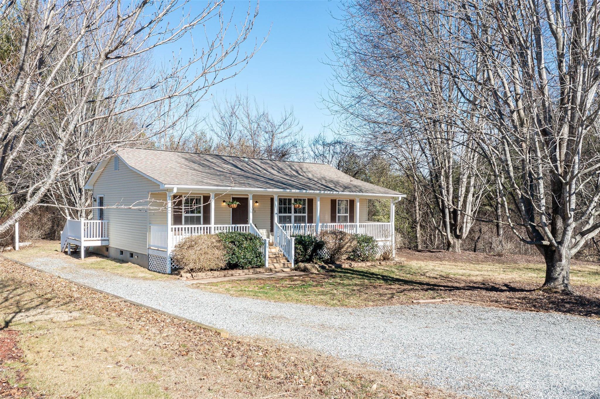 Charming Mars Hill cottage surprises with a spacious feel with smart, flowing floorplan, just moments to quaint Mars Hill and 20 minutes to vibrant Asheville. Enjoy privacy with en suite baths, a .59 acre level yard and covered front porch for peaceful mornings. The sunroom’s vaulted ceilings invite natural light year-round. Fresh paint and flooring make moving in a cinch! *To allow for interested parties to show, offers will be reviewed after 3pm on Monday, 2/5.*
