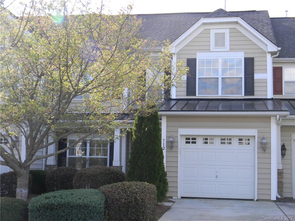 Looking for that special townhome well this is the one.  Master on the main floor.  Master bathroom with double sinks, soaking tub and separate shower.  This home has been freshly painted and new carpet throughout. Formal dining room, kitchen with stainless steel appliances and granite countertops.  Two large bedrooms with walk-in closets upstairs and a loft.  This home is in walking distance to shopping and dining.