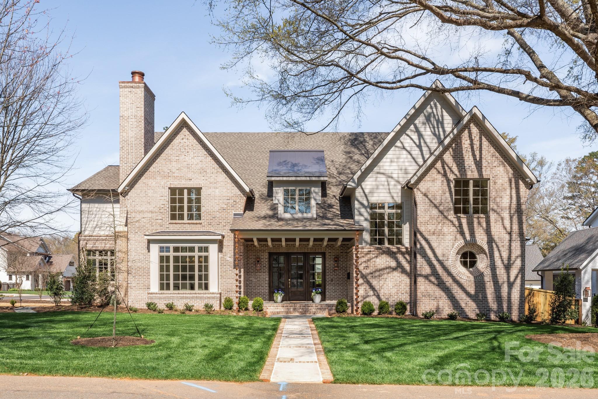 Beautifully crafted new construction home from THR Design Build sits on a highly desired corner lot in Cotswold. Low slung rooflines, custom built brackets, and hand crafted brick detailing create an elegant exterior with beautiful curb appeal. Inside features dreamy white oak ceiling details with a breathtaking chandelier in the foyer, porcelain surround fireplace in the dining room and a plaster surround fireplace in the great room. Floor to ceiling door units open from the great room and kitchen area out to the back porch and patio of an entertainer's dream. The chef's kitchen will delight any cook, amateur or professional, with its 48" Thermador dual fuel range, 48" refrigerator, 24" wine fridge column, and Bosch dishwasher. Hide away all of your kitchen appliances in the spacious pantry off the kitchen with a second Thermador dishwasher. 5 bedrooms, 5 full bathrooms, and 2 half baths. An office, bonus room, and two car garage pre-wired for electric charging round out this stunning home. Other features include oversize Pella windows and doors, dual Trane high effic heat pumps, and 2 Rinnai tankless WH. 10 foot ceilings on the main level and 9 foot celings on the upper level. Expansive primary suite with washer/dryer hookup in the closet. This home is ENERGY STAR rated.
