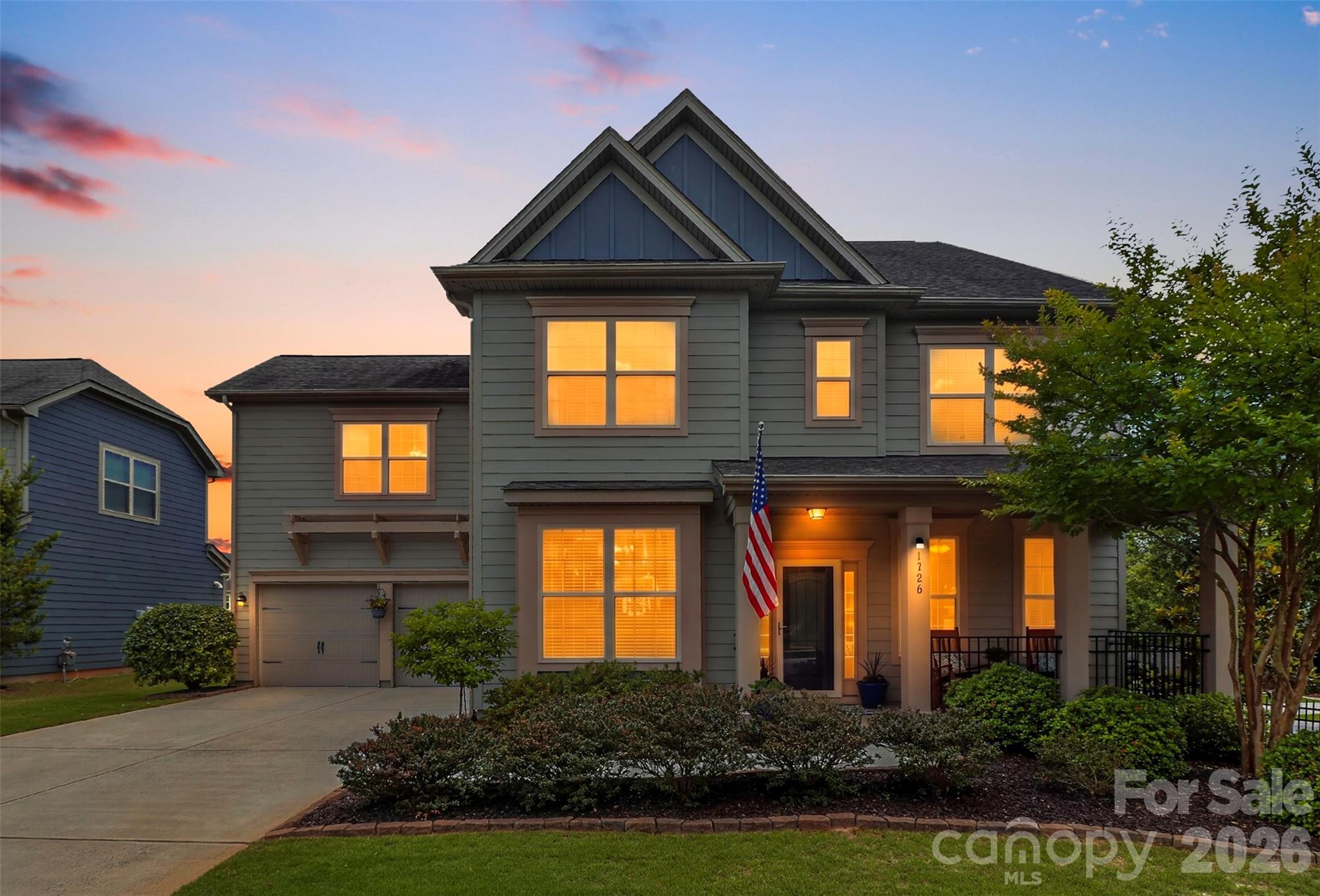 Welcome to 1306 Corey Cabin Ct, a fully updated home in the highly sought-after Waterside at the Catawba community of Fort Mill! Situated on a beautifully enhanced corner lot, this meticulously maintained 5-bedroom, 4.5-bath residence offers 3,621 square feet of thoughtfully designed living space with elevated finishes, practical functionality, and exceptional indoor-outdoor living.

Designed for both everyday life and entertaining, the versatile floor plan features a dedicated office with glass French doors, a main-level guest suite, spacious flex room, and an oversized primary retreat complete with a fireplace—creating the perfect space to unwind. Fresh interior paint, updated lighting, new luxury vinyl plank flooring throughout the main level, and new carpeting on the second level, provide a truly move-in-ready experience.

The beautifully remodeled kitchen serves as the heart of the home, showcasing a stunning oversized Cambria quartz island, quartz perimeter countertops, tile backsplash, painted cabinetry with soft-close features and updated hardware, expansive walk-in pantry with custom built-ins, and seamless flow for gathering and entertaining.

The luxurious primary suite offers a spa-inspired bath remodel featuring new tile flooring, an expanded frameless walk-in shower, soaking tub, dual vanity, lighted mirror, and enhanced ventilation. The custom walk-in closet includes built-ins and upgraded lighting.

Step outside to enjoy a fenced backyard retreat. The paver patio, screened porch with custom sunshades, gas grill line, and extensive landscaping—including various trees, flowering shrubs, and custom edging—create a peaceful setting for relaxing or entertaining year-round.

Various upgrades continue throughout, including a tankless gas water heater, new multi-stage Trane HVAC system and furnace, full property irrigation system with separate water meter, plantation shutters, built-in garage drop zone, attic storage expansion, updated powder bath with board and batten detail, laundry room cabinetry and drying rack, storm doors, and new garbage disposal. 

Enjoy life in Waterside at the Catawba with resort-style amenities including a clubhouse with fitness center, community pool, tennis/pickleball courts, playground, walking trails, river access with kayak launch, year-round community events, and convenient access to Banks Athletic Park—all just minutes from top-rated Fort Mill schools, shopping and dining. This one is a must see!