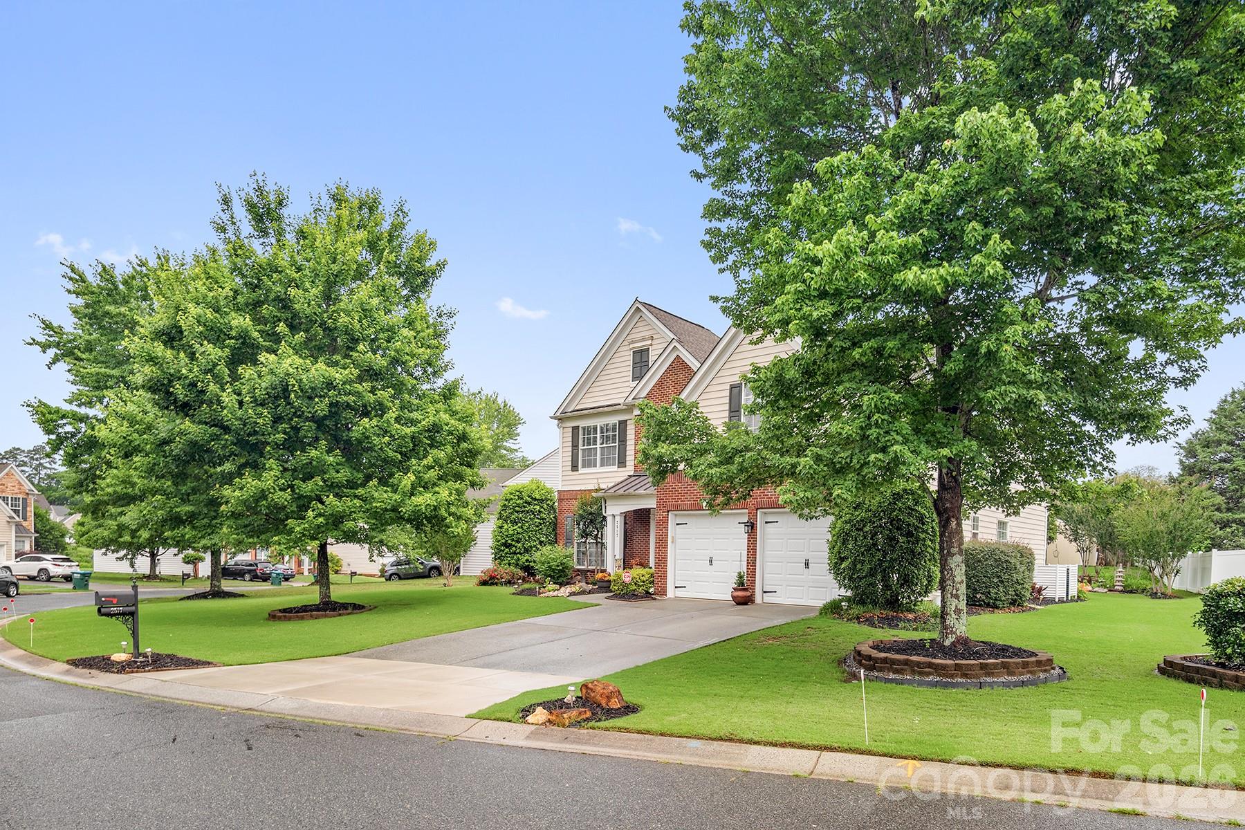 Meticulously maintained home just minutes from charming downtown Waxhaw featuring restaurants, boutiques, and local shops. This beautiful open floor plan offers gleaming hardwood floors, upgraded lighting, elegant black iron stair spindles, and abundant natural light throughout. The spacious main-level primary suite includes a whirlpool tub, quartz dual vanity, and separate shower with new glass enclosure. The formal dining room showcases a tray ceiling, while the gourmet kitchen features granite countertops, tile backsplash, gas range, and newer stainless-steel appliances.  Upstairs offers three generously sized bedrooms, including an oversized room perfect for a bonus space or home office, plus convenient walk-in attic storage. Enjoy outdoor living in the private, professionally landscaped backyard oasis complete with mature trees, spacious patio with composite material, and multiple seating areas. Plenty of backyard space to build a pool if desired. Washer and Dryer Convey. Three-Year-Old 10x12 Shed would make a good He/She Shed, playhouse or extra storage. Zoned for Award Winning Union Schools!  MOTIVATED Seller!