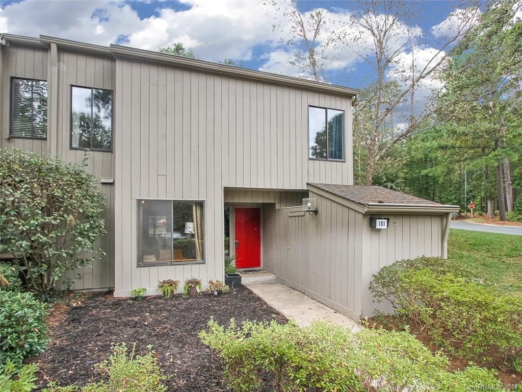 Live like you're on vacation! 3 BR end unit condo in River Hills, a gated, waterfront community on Lake Wylie w/24 hour security, private pool, waterfront beach, fire pit, country club, golf course, marina, walking trails & more. Bright & airy w/2 story great room. Updated kitchen w/breakfast bar. Front room flex space can be used for office, etc. Dining area opens to private patio backing to trees. Fresh paint. New AC unit, HW heater & smart thermostat.