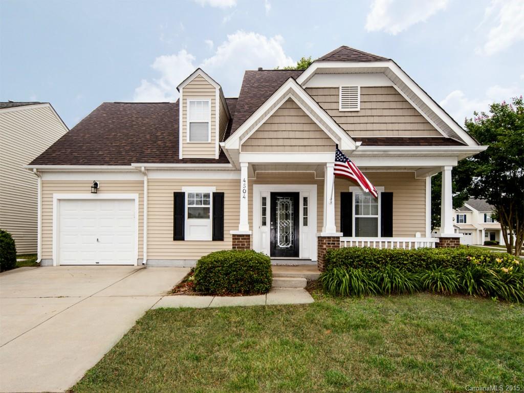 Charming 1.5 story home w/Master Bedroom & en suite bath downstairs. Updated w/all new bamboo flooring on entire first floor, spacious bedrooms upstairs separated by loft space overlooking the 1.5 story great room featuring surround sound. Kitchen is updated with stainless steel appliances. This home includes all appliances - washer & dryer too! Outdoor terrace is covered & wired for tv, backyard is private, fenced, & has raised beds for planting. New Roof in '14. Great community features!