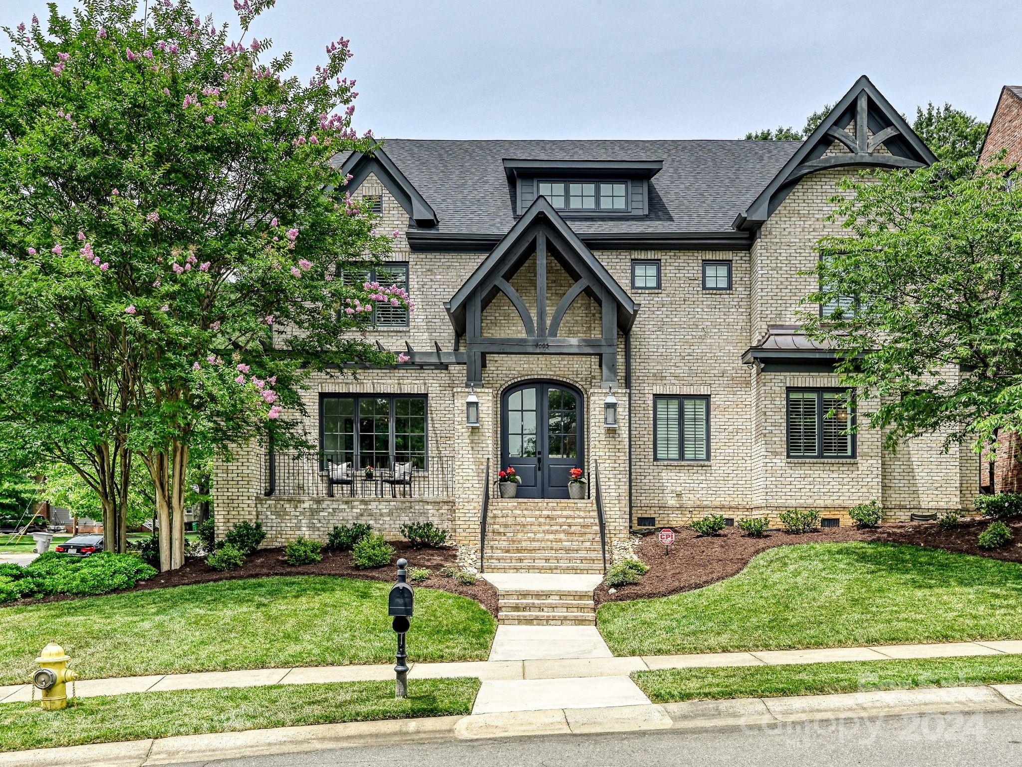 Handsome custom-built home in the heart of South Park was built by Louis Giacomini for the sellers in 2017. This stately 2.5 story home features high ceilings, hardwood floors, neutral decor, and is in pristine condition.  Wide foyer welcomes you into the home and flows into the living room with coffered ceiling and stone fireplace with 100-year-old mantel which is flanked by built-in bookcases. The chef's kitchen opens to the living room and is perfect for entertaining. The living room flows to the covered porch overlooking a beautiful pool and spa. The primary suite overlooks the pool and garden and features his and hers closets. The 2nd level features a bonus room and 3 en-suite bedrooms. A craft room and a dance studio are added bonuses. The 3rd level is a 686 square foot walk up attic which is insulated and easily finished. A two-car carriage house has a 624 square foot apartment complete with kitchenette and full bathroom. This beautifully maintained home is move in ready!