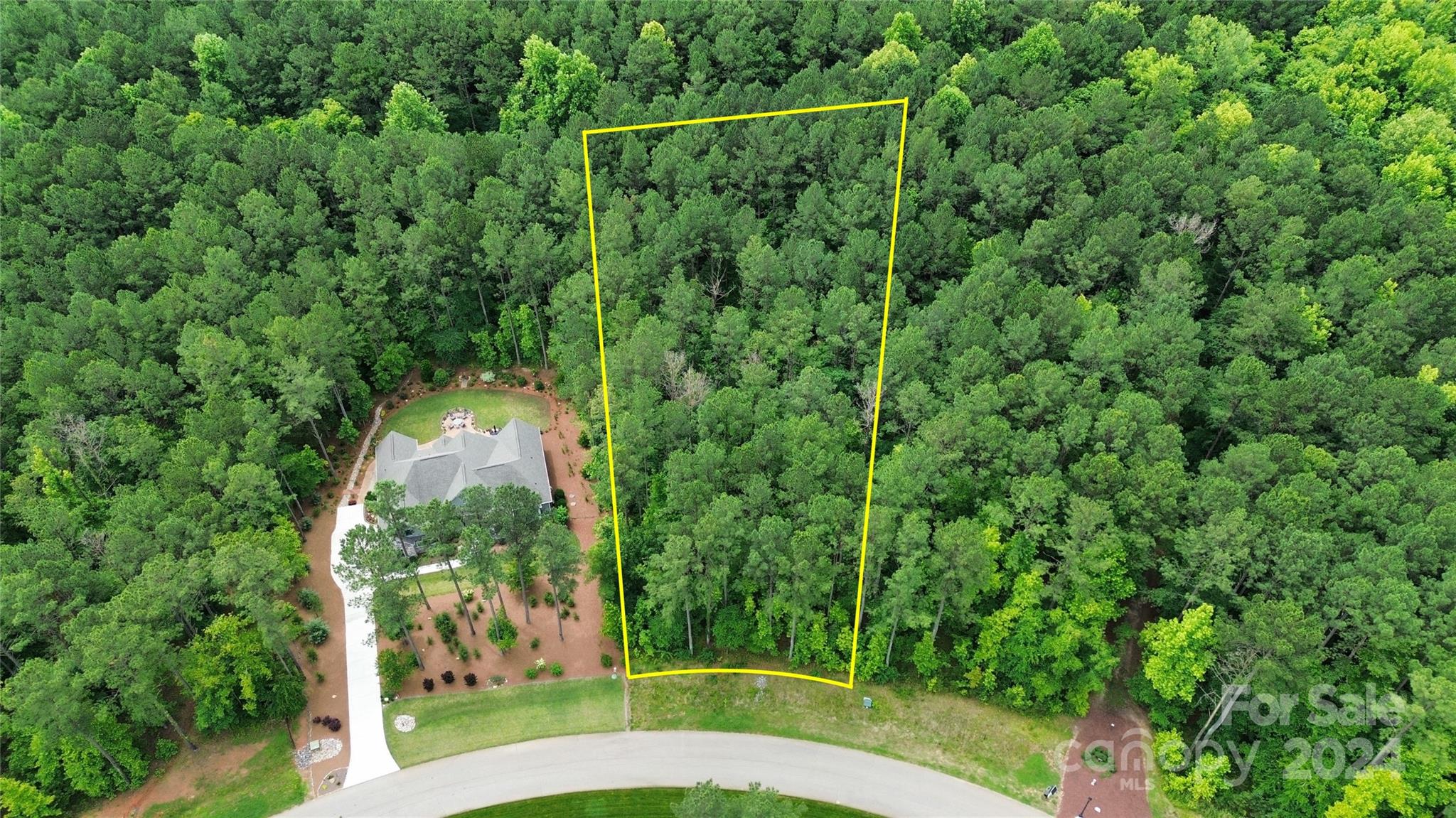 Bring your own builder to build a custom home in the wonderful Riverchase Estates community with beautiful custom homes throughout and a top of the line Clubhouse and amenities. This lot gently slopes and could potentially be a slab or crawl foundation, and backs up to the 500 acre Nature Preserve and Catawba River! Also for sale is the lot next door that could be combined together for a 1.69 acre parcel.