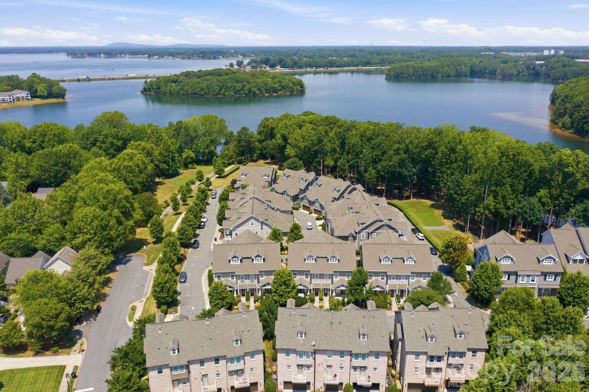 Nestled in a prime location within walking distance to Historic Main Street and Davidson College, this stunning 3-story townhome offers the perfect blend of small-town charm and upscale, modern living. Enjoy easy access to boutiques, local dining, the vibrant farmers market, and all the cultural events the college town has to offer.

Spanning approximately 3,200 square feet, this thoughtfully designed home features 4 spacious bedrooms, 4.5 baths, and high-end designer finishes throughout. The heart of the home is a chef’s kitchen, perfectly equipped for entertaining, while a premium elevator provides seamless access to all three levels.

Outdoors, you will find fantastic spaces to unwind, including a welcoming front patio and a private deck off the primary bedroom. This property also boasts access to Lake Davidson, complete with a community beach, a cozy firepit, and kayak racks for your water adventures.

Designed for a true "lock-and-leave" lifestyle, this low-maintenance gem is perfect for busy professionals, downsizers, or anyone looking for a premium, walk-to-everything retreat. Don't miss this rare opportunity to own a piece of Davidson's finest!

Convenient to Lake Norman, Uptown Charlotte and Charotte-Douglas International Airport.