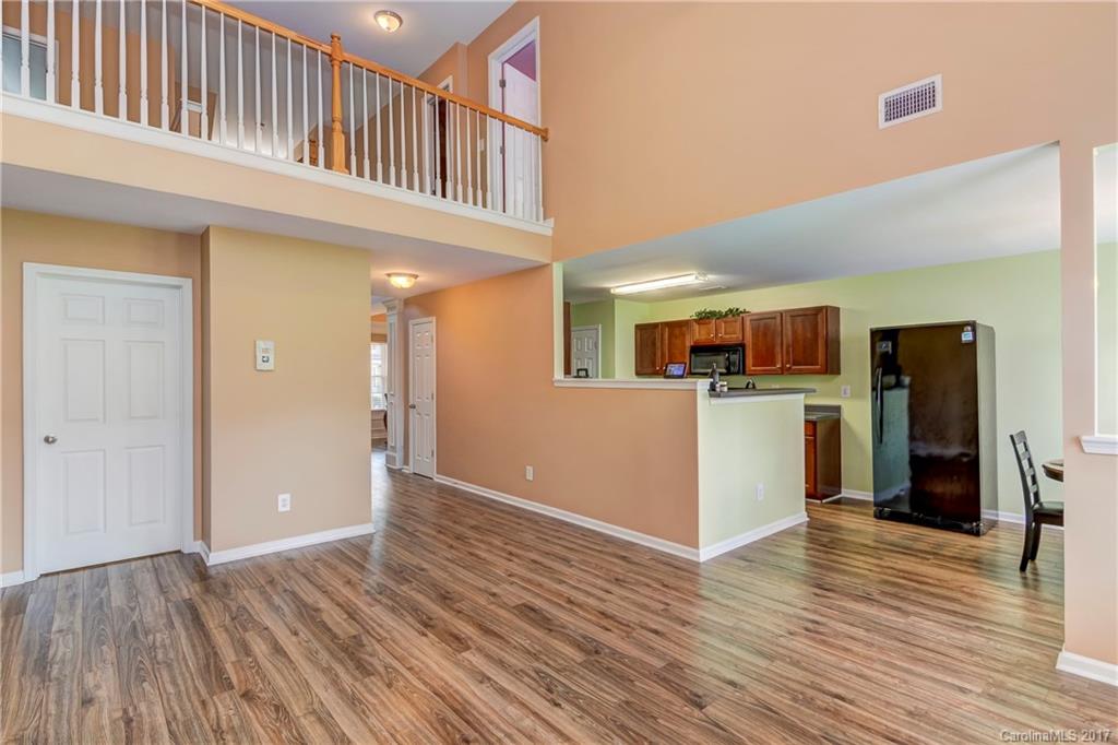 Move-in Ready home in Pennington Place. First Floor Features, Gorgeous Flooring, Open Floor Plan Concept with the Kitchen Overlooking the Breakfast Area, Dining Area & 2-Story Great Room. Entertainers Dream!  Master Bedroom on 1st Floor & Complete with it's Own Private Bathroom, Ceiling Fan & Trey Ceiling. 2nd Floor with 3 additional Large Bedrooms & Vaulted Ceilings. Outdoor Features Include Covered Front Porch, Patio, 2 Car Garage with Ample Parking & Open Flat Lot. Close to Shopping & More!