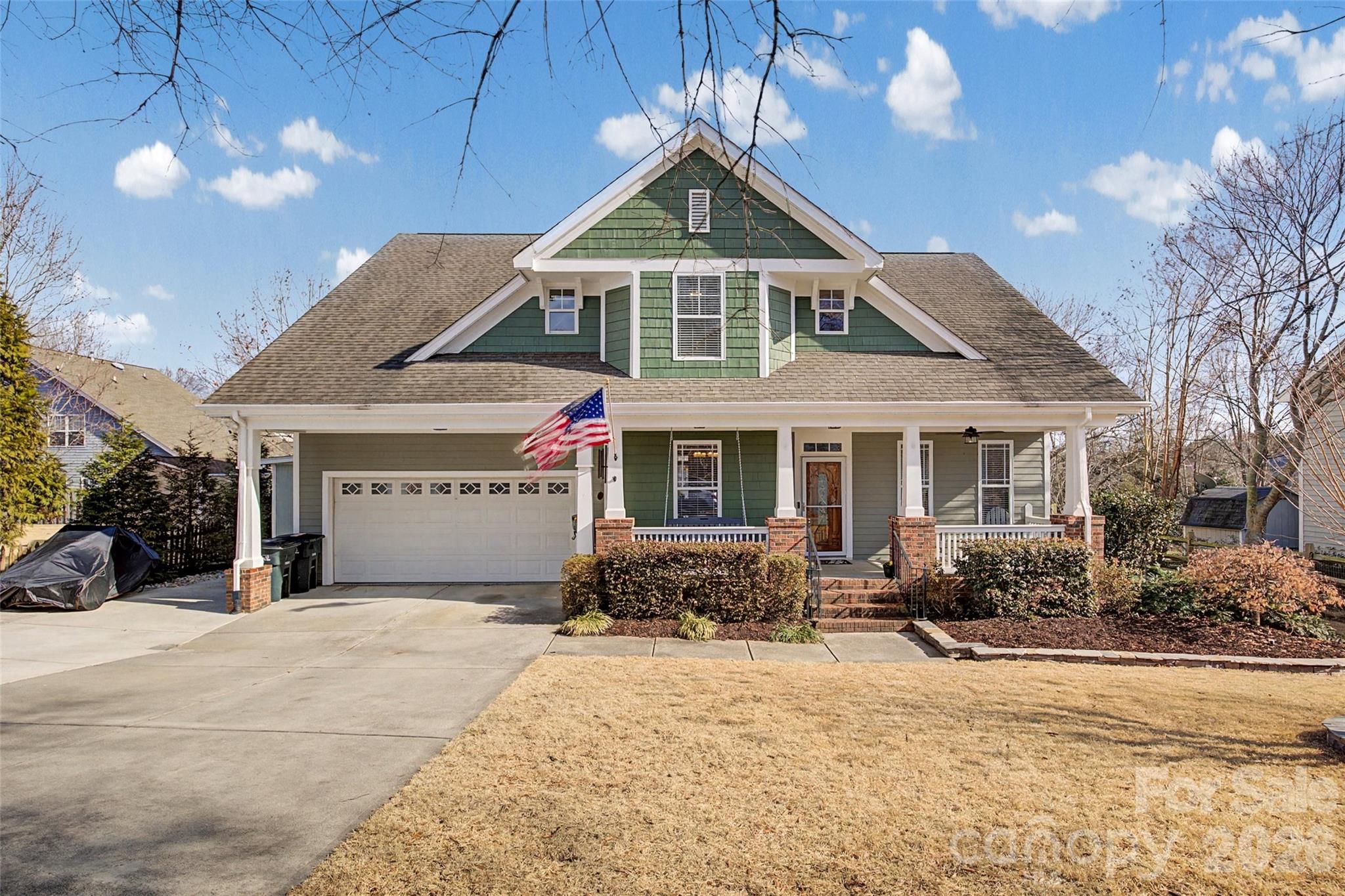 Recent appraisal reflects value of 785k! Welcome to life on the peninsula in Tega Cay, where front porches, friendly waves, and sunset golf cart rides are just part of the everyday rhythm. This beautiful 5 bedroom, 3.5 bath Arts & Crafts–style home pairs timeless character with modern flexibility, offering the space you need and the lifestyle you’ve been dreaming of. Inside, you’ll find warm architectural details, inviting living spaces, and a thoughtfully designed floor plan: Highlights include: Tankless water heater in 2024 Sealed and De-humidified crawl space in 2021 Ozone/UV air scrubbers in HVAC system Smart thermostats for HVAC Remote controlled gas fireplace Wifi enabled full-yard irrigation Exterior upgrades include Trimlite permanent, configurable, decorative exterior LED system Ring camera/flood lights front and rear Mounted pressure washers in front and rear of home Separate HVAC split units in garage and patio Private primary suite on the main level for easy everyday living Bright and relaxing four-season porch, perfect for morning coffee or cozy evenings year-round Four spacious bedrooms upstairs One bedroom smartly converted into a secondary kitchen/laundry space, ideal for guests, multi-generational living, or hobby space.  Large backyard with room for a pool, play space, or backyard oasis. Classic Arts & Crafts curb appeal with welcoming charm And then there’s the lifestyle… Living in Tega Cay means stepping outside your door and straight into community: Golf course Outdoor pool Tennis courts Pickleball Parks, trails & greenways Lake access, beach areas & water sports Kayaking, paddleboarding & boating Local restaurants & gathering spots Fourth of July parades and fireworks Summer movies in the park Santa riding through the Cay on the firetruck tossing candy to kiddos All located within the highly sought-after Fort Mill School District, and just minutes to Charlotte and Charlotte Douglas International Airport for an easy commute or travel. This isn’t just a home; it’s a place to plant roots, build memories, and truly belong. Come experience peninsula living for yourself. Schedule your private tour today.