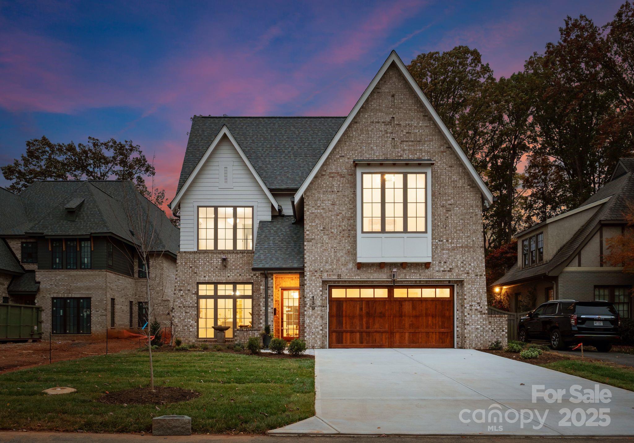 Welcome to 150 N Canterbury Rd, a stunning new build by Maverick Building Company in the heart of Cotswold. This thoughtfully designed home offers an open floor plan that seamlessly blends indoor and outdoor living.The chef’s kitchen showcases paneled appliances, custom inset cabinetry, a 48" Wolf range, quartz backsplash, and designer finishes throughout. The living room features wood beams, a gas fireplace with a cast stone surround, and custom built-in storage. The dining area impresses with oversized windows, a groin vault ceiling, a wet bar with a beverage fridge, and elegant designer lighting. Enjoy exceptional outdoor living with a covered back porch complete with an outdoor kitchen and built-in grill, a pool and hot tub, a built-in fire pit, and an 8’ stained privacy fence with usable yard space (2 patio ceiling heaters to be installed soon). Upstairs, you’ll find four bedrooms, a bonus room with a wet bar, and a convenient laundry room. The primary suite offers a spa like retreat with a walk-in shower, a private tiled changing area, and beautiful finishes. This is Maverick Building Company’s third home on this prestigious and sought after Cotswold street.