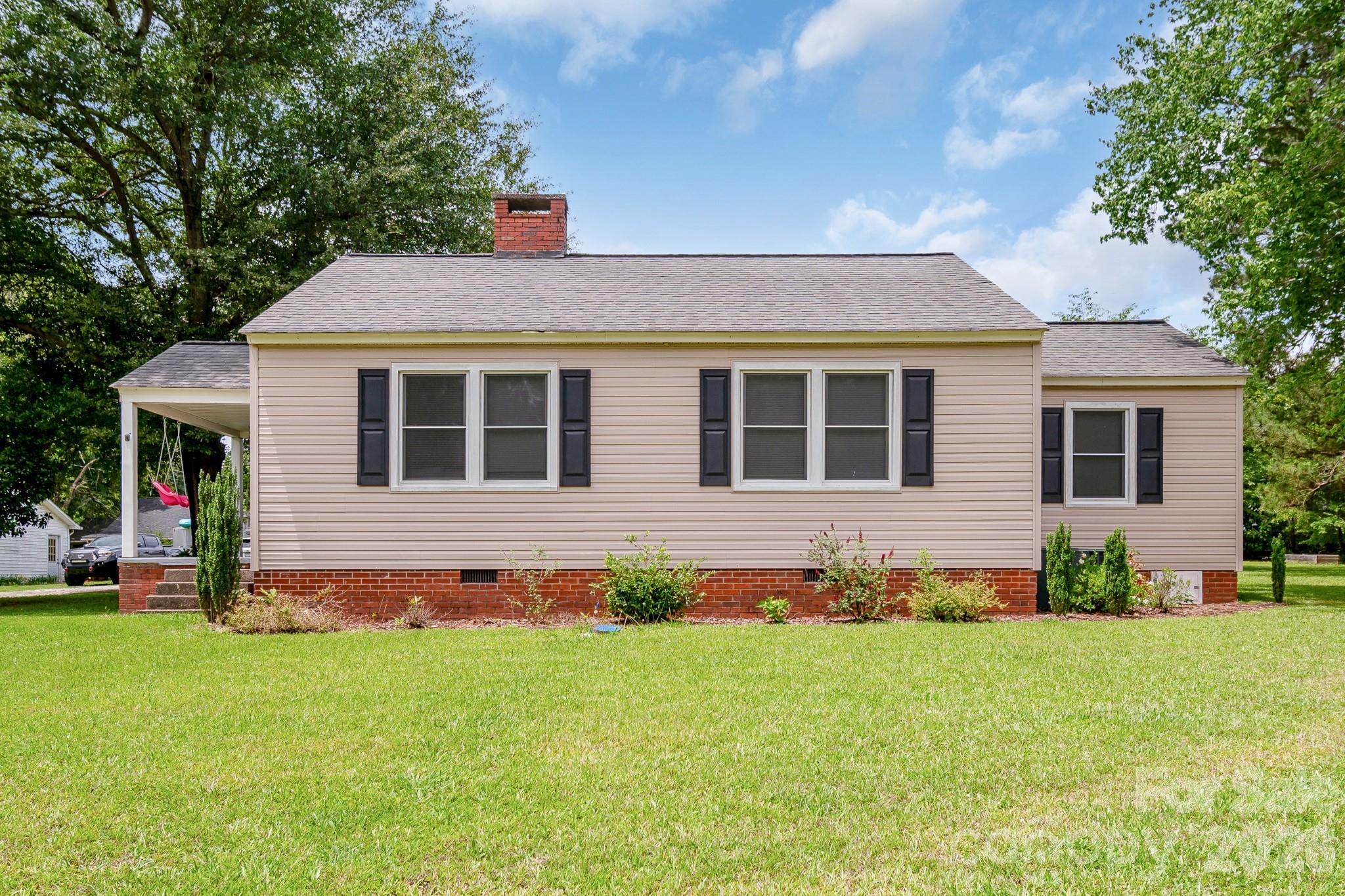 Completely remodeled and move-in ready! This beautiful home features new windows, an almost new roof, a cozy gas fireplace, and granite countertops in both the kitchen and bath. Enjoy stylish updates throughout plus the added bonus of an outbuilding for extra storage or workspace. A must-see!