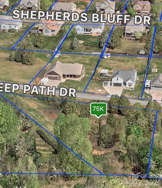 Ready to build a new home? Here's a little slice of North Carolina for you! This lot offers great topography and limited traffic being set towards the end of a cul-de-sac. The property sits in an established neighborhood near the towns of Statesville, Troutman, and Mooresville centrally located between Charlotte, Hickory, Winston Salem, and the NC Mountains. Land in the Lake Norman area is becoming hard to find so don't miss a rare opportunity to secure your future homeplace. This lots address was based on the driveway location from a previous septic permit that has expired, so it’s subject to change. A soil evaluation determined the footprint and 3 bedroom maximum. Survey markers are visible to help see property line and easement locations. Sheep Path Lane in Shepherd's Bluff is ready for a new owner. Don't wait!