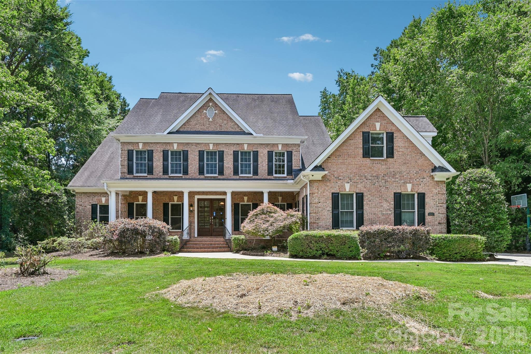 Experience the best of Ardrey Acres living in this picturesque full-brick home designed for comfort, connection, and unforgettable entertaining. A covered front porch sets a warm welcome, while the private backyard feels like a resort retreat with a sparkling pool, outdoor kitchen, screened-in porch, and fenced yard for year-round enjoyment. Inside, hardwood floors flow throughout the main level, connecting elegant formal living and dining rooms with a comfortable great room centered around a fireplace and views of the backyard. The gourmet kitchen is made for gathering, featuring granite countertops, stainless steel appliances, beautiful cabinetry, and a bright breakfast area. A main-floor guest suite with full bath offers ideal flexibility for visitors or multigenerational living. Upstairs, the luxurious primary suite is a true escape with tray ceilings, large sitting room, ensuite bath with dual vanities, and a spacious closet. Generous secondary bedrooms, two additional baths,