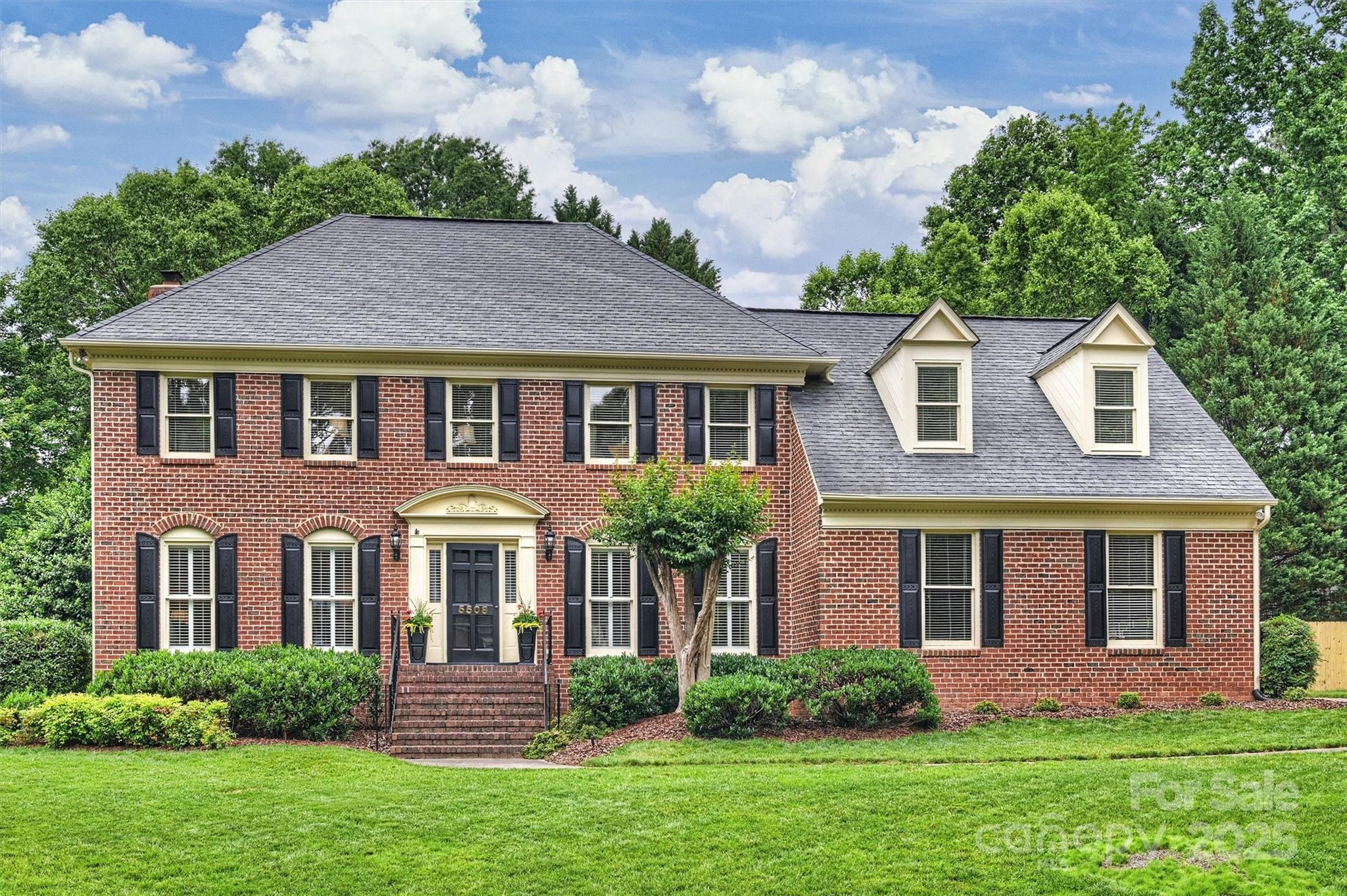 Beautiful full-brick traditional home with 4 bedrooms, 2.5 baths, and spacious bonus room, all nestled on a beautifully landscaped lot with a level and private backyard—perfect for relaxation or hosting. Step inside to find gleaming hardwoods, a generous family room perfect for gatherings, welcoming kitchen and breakfast area overlooking the patio and picturesque backyard and inviting living & dining rooms; ideal for entertaining. Dual staircases offer convenient access throughout the home—especially the back staircase leading to the bedrooms and the sprawling bonus room. This versatile space is large enough to accommodate a home gym, playroom, or home office. The large primary suite is filled with natural light and offers a peaceful retreat. Just minutes from The Promenade, Providence Commons, Blakeney, Stonecrest, Waverly, Rea Farms, Arboretum, & I-485. Full irrigation. Award-winning South Charlotte schools! Berkeley is one of the most beloved neighborhoods in all of South Charlotte!