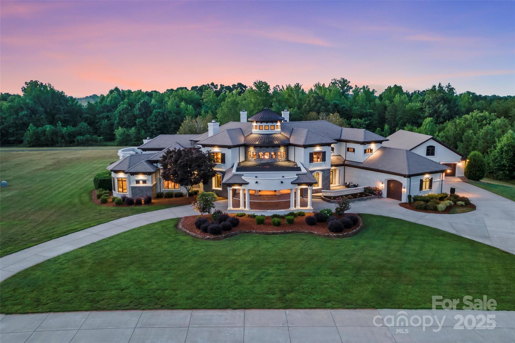 World class equestrian estate situated on 140acres offering the ultimate in luxury living. Stunning 9000+sqft renovated residence w/ an amazing outdoor entertainment area including vanishing edge upper pool, pool house/cabana & putting green. Top of the line equestrian facilities greet you as you enter the gated drive w/ meticulously maintained grounds framed by white fenced pastures & paddocks. 5500sqft European-style stables w/ 18 custom arch 10x14 stalls including self-waterers & rubber matting, 136’x240’ lighted & enclosed covered arena w/ viewing area, 60’ covered solid-wall round pen, 1650sqft pole barn, & stable lounge w/ attached climate-controlled 18 locker tack room. Fitness training facility/shop, detached garages & more. Make this your premier equestrian private residence; could be a future potential development possibility for add'l homesites as road infrastructure & underground power have been run. Buyer would need to contact County to further explore the possibilities.