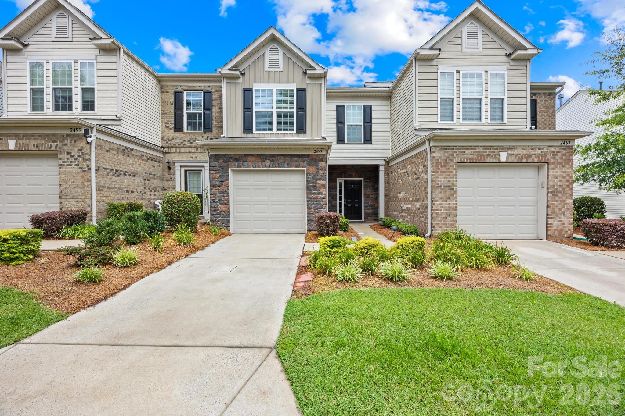 Ideally situated between some of Charlotte's most prestigious neighborhoods, this beautifully maintained 3-bedroom, 2.5-bath townhome with garage offers the ideal combination of low-maintenance living, exceptional amenities, and an unbeatable SouthPark location. Nestled within the gated community of Park South Station, you'll enjoy being just minutes from SouthPark Mall, the Light Rail, Uptown, and premier dining and shopping. Designed for both everyday living and effortless entertaining, the open-concept floor plan features hardwood floors throughout both levels - so no carpet! The inviting living room is anchored by a cozy gas fireplace, while the beautifully appointed kitchen showcases white cabinetry, granite countertops, a stylish tile backsplash, gas range, and abundant workspace. Upstairs, the spacious primary suite features a tray ceiling and private en-suite bath, while 2 additional bedrooms, a full guest bath, and a conveniently located 2nd floor laundry room provide both comfort and functionality. The townhouse has just been freshly painted plus the refrigerator, washer/dryer are all included, making this home truly move-in ready. Park South Station offers one of the area's most impressive amenity packages, including a junior Olympic swimming pool, clubhouse, fitness center, playground and a dog park. Residents also enjoy direct access to the Little Sugar Creek Greenway, perfect for walking, running, or biking. With lawn maintenance included by the HOA and an exceptional location that places everything South Charlotte has to offer just moments away, this home offers the perfect blend of convenience, community, and carefree living in one of the city's most popular gated neighborhoods.