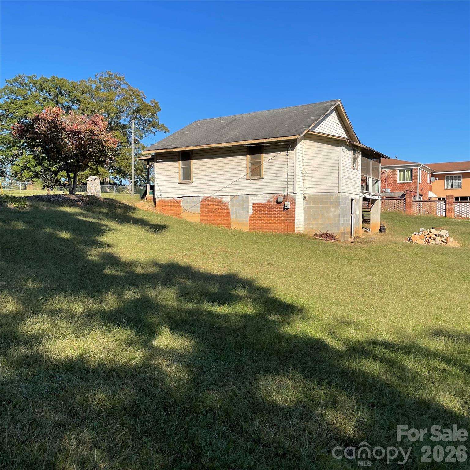 Two parcels totaling approximately 5 acres are available in a highly sought-after area. The existing home is fully gutted, providing a perfect opportunity to start fresh. The property is cleared, offering ideal conditions for new construction or residential development. It is conveniently located near shopping, schools, and major roads, making it an excellent choice for builders or investors ready to bring their vision to life. Surrounded by well-maintained homes and new growth, this area continues to experience strong demand for new housing. The location combines the tranquility of spacious land with easy access to major roads, shopping, schools, and the conveniences of downtown Hickory.