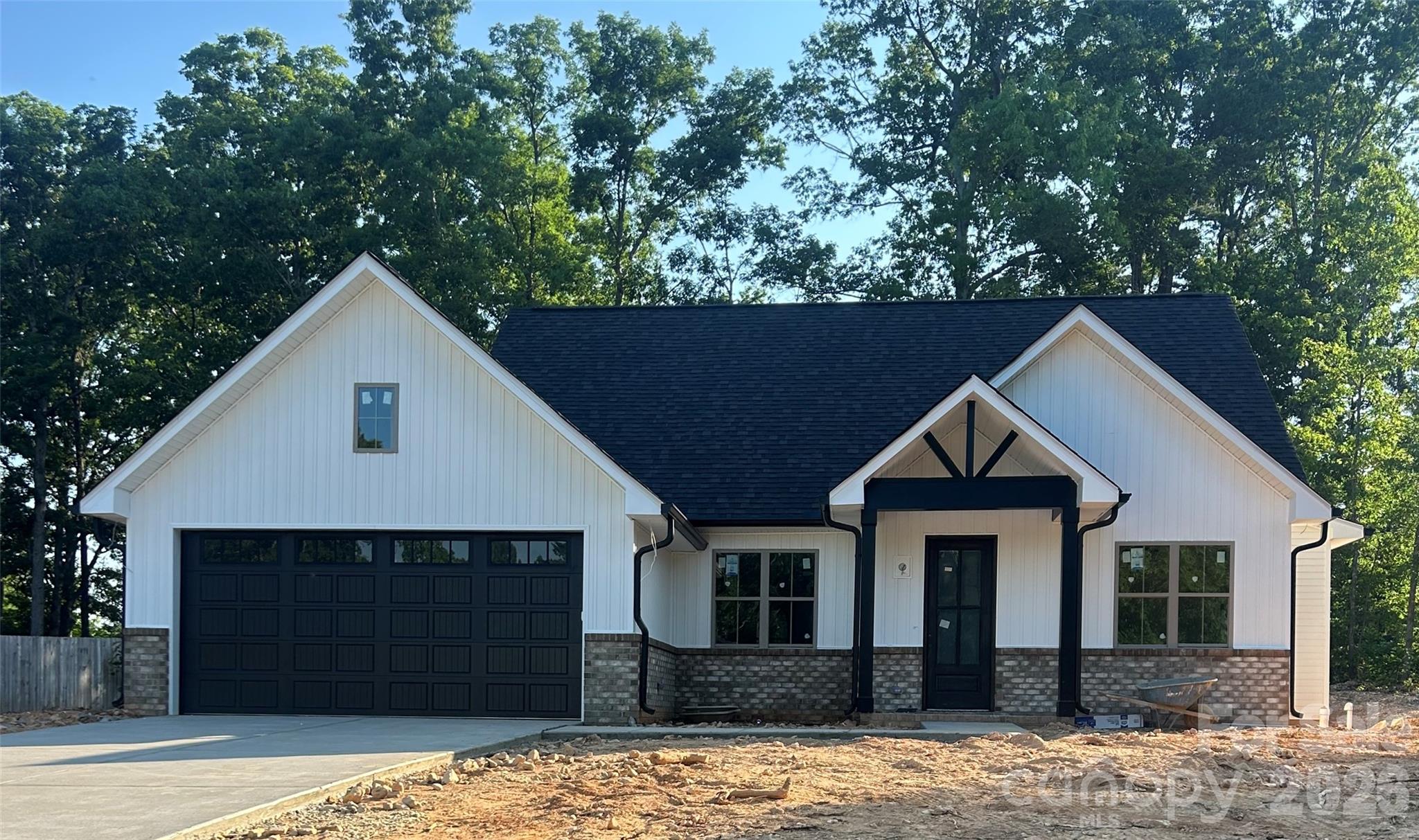 Welcome home to this beautiful new construction home situated on a spacious 0.50-acre lot in an established neighborhood with no HOA. Offering approximately 1,700 square feet, this thoughtfully designed split-bedroom floor plan features 4 bedrooms, 2 full bathrooms, and a 2-car garage.

Step inside to find luxury vinyl plank flooring throughout the home, creating a seamless and low-maintenance living space. The kitchen and living areas are designed for both everyday living and entertaining, complemented by high-end finishes and attention to detail throughout. The primary suite offers privacy from the secondary bedrooms and features a well-appointed bathroom with tile flooring. Tile floors are also featured in the secondary bathroom for added durability and style.

Storage is abundant with custom-built shelving in the pantry and closets, maximizing organization and functionality. Enjoy the benefits of new construction while being nestled in an established community setting with room to spread out and no HOA restrictions.

Estimated completion: 6/19/26. Professional photos and measurements are scheduled for 6/19/26. The design choices for this property have already been chosen - finals (CO, power, final clean, landscape, etc.) are happening this week.