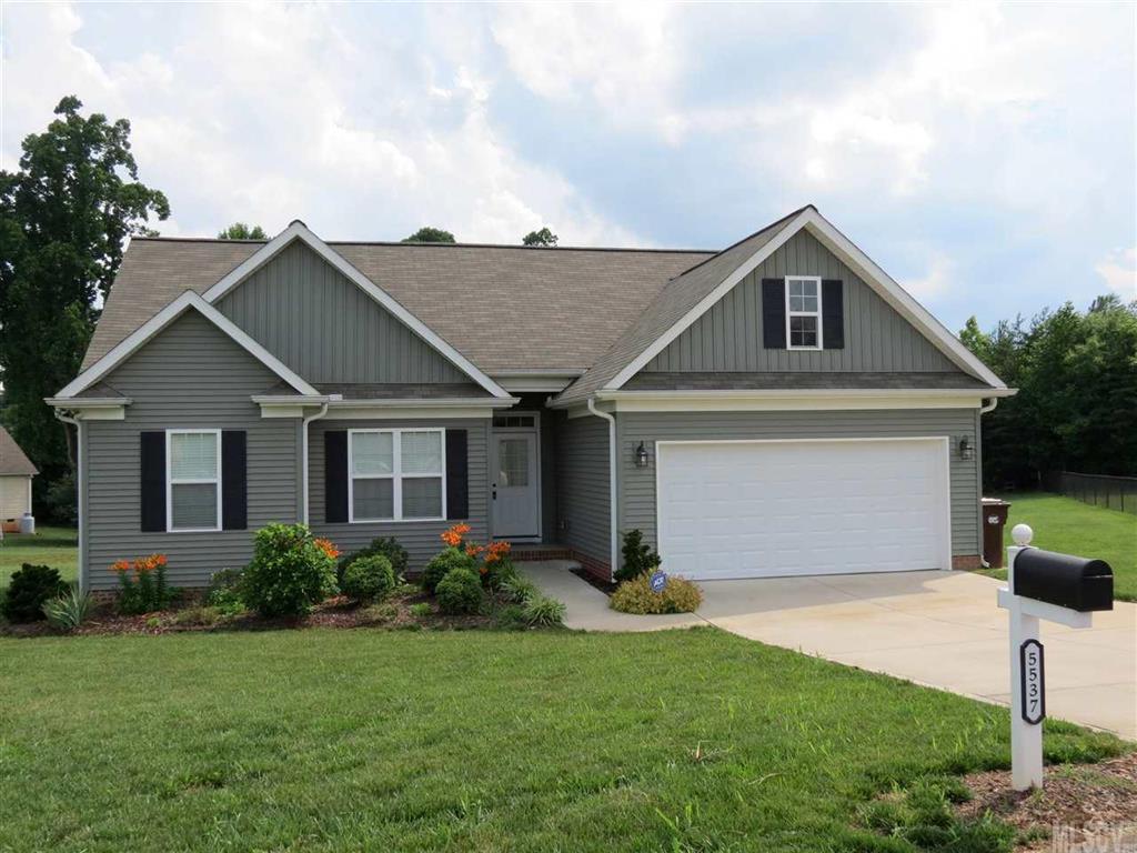 Immaculate home in country subdivision.  Spacious living room with hardwood floors and vaulted ceiling.  Fireplace with gas logs.  Kitchen has granite countertops, tiled floor, pantry and custom cabinets.  Sliding doors to deck.  Amazing master suite with tray ceiling, walk-in closet, tiled wrapped garden tub and dual sink vanity.  Large laundry room.  Split bedroom floorplan.   Level yard and great curb appeal.  Convenient to Hickory and Mooresville.  Low taxes and great schools.  Must see home