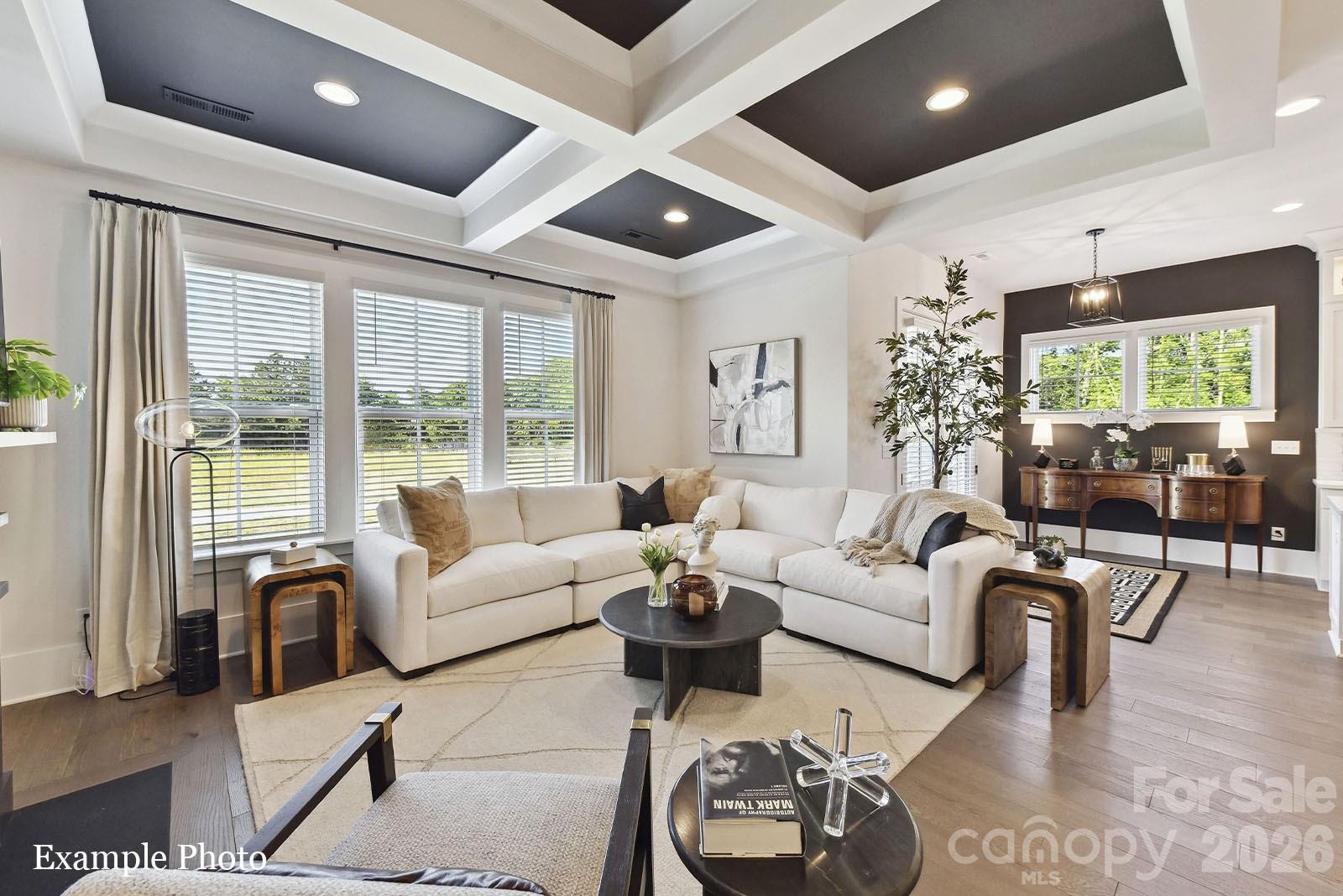 Live near "The Bowl at Ballantyne" and Charlotte's 1st "Wegman's"! Enjoy an Elevated Lifestyle Surrounded by Everyday Conveniences. Own a Well Appointed, New Townhome with ROOFTOP TERRACE in One of Charlotte's Most Sought-After Locations, Zip Code 28277. Step inside this Low Maintenance Townhome that lives like a Single-Family Home and be ready to call it "HOME". Featuring Craftsman Style Architecture, 10' Ceilings on the 1st Floor, an Open Concept Floor Plan, Covered Rear Porch off the Kitchen, Covered Balcony off the Primary Bedroom, 6" Hardwood Floors on All Levels, Gas Fireplace, Upgraded Ivory Cabinets, Upgraded Quartz Countertops, Stainless Steel Kitchen Appliances including a Bosch 36" Gas Range, Refrigerator, Microwave, Dishwasher, Blinds, Upgraded Closet Shelving Throughout, Washer/Dryer, Epoxy Floor Finish in the Garage, and More! Buy Today and Receive Up To $25,000 Towards Closing Costs, Lowering Your Interest Rate and/or Reducing Your Sales Price!