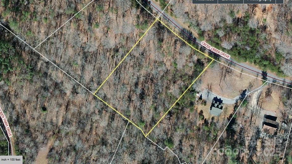 Discover your perfect retreat on this exceptional 1.85-acre parcel nestled within a secure gated community, offering the ideal blend of privacy, natural beauty, and modern convenience. This gently sloped lot provides an excellent building site with easy access via well-maintained paved roads that wind throughout this meticulously cared-for neighborhood. One of the property's most captivating features is the robust creek that runs along the bottom boundary, creating a serene natural soundtrack combined with the surrounding tress and natural groud cover.  

What truly sets this land apart is the community's unique allowance for campers up to ten months per year, providing incredible flexibility for those who want to enjoy their property immediately while planning for future construction, or for those who simply prefer the camping lifestyle with the security and amenities of a established neighborhood. Residents enjoy access to a well-appointed park perfect for gatherings and outdoor activities, a playground that makes this community ideal for families, and a recreational area designed for year-round enjoyment.

The paved road access means you'll never worry about weather-related access issues, and the community's commitment to maintenance ensures your investment is protected. The gated entry provides peace of mind and security while maintaining the natural, relaxed atmosphere that makes this community so special. 

Whether you're looking to build immediately, camp seasonally, or hold for future development, this versatile parcel in a sought-after gated community represents an outstanding value and lifestyle opportunity.