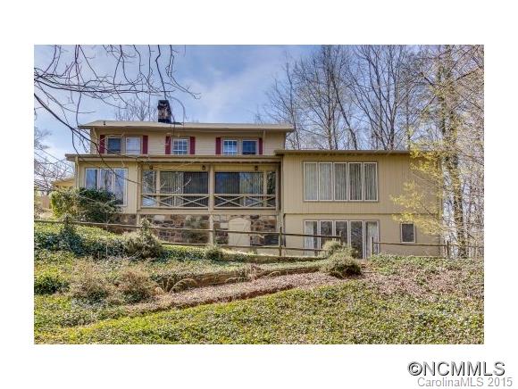 Charming Lake House Retreat or perfect for everyday living!  Master w/ newly remodeled bath, Lg living room w/FP, Florida rm,  formal dining & sep. breakfast rm. Lower level  w/new ceiling to flr windows, huge family rm, kitchenette & full bath! Brand new remodeled kitchen w/granite, tile floors, carpet & refinished hardwood flrs.  Enjoy your private boathouse w/dock, perfect for entertaining, swimming, relaxing & enjoying beautiful Lake Lanier.