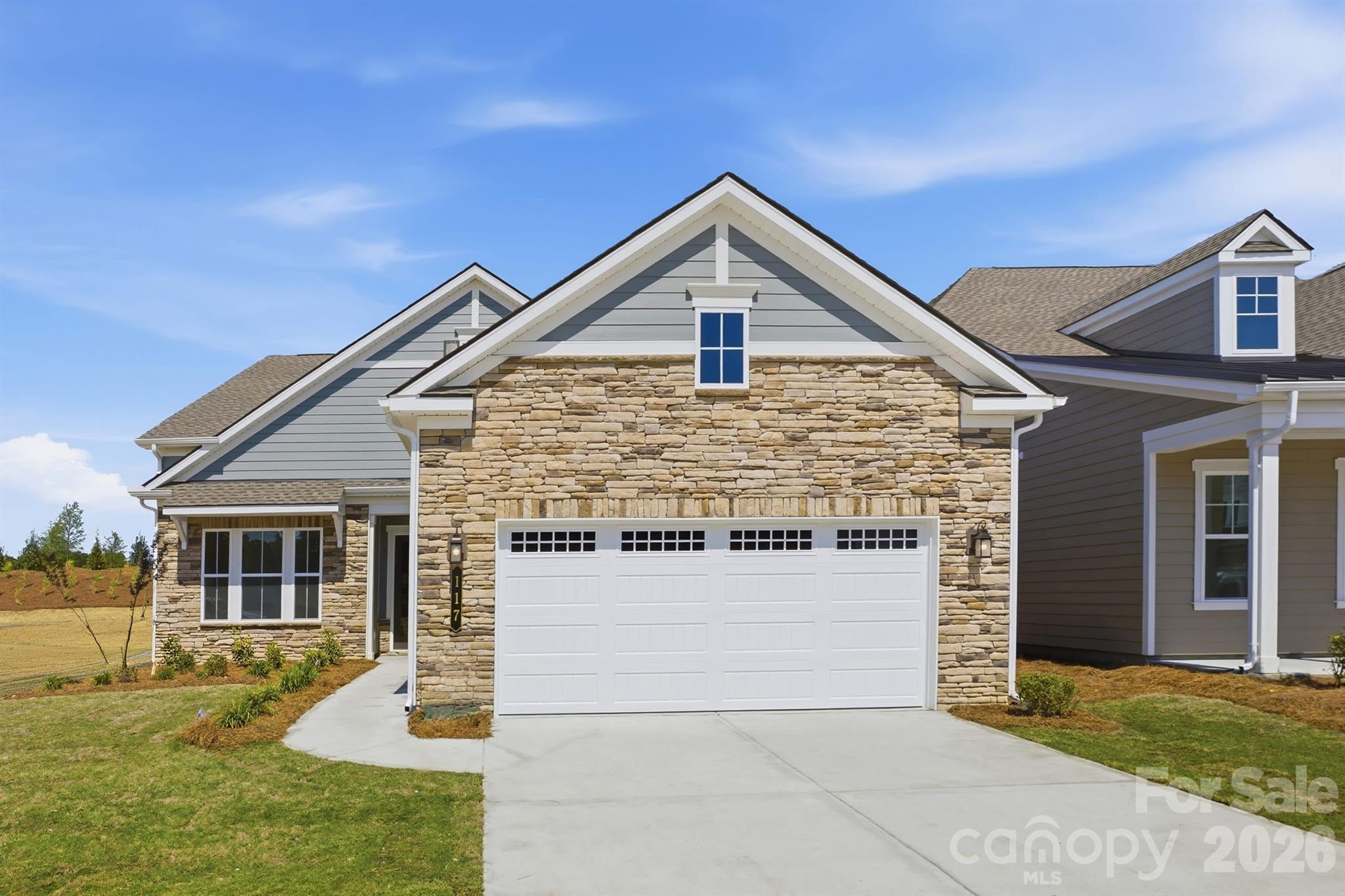 *NEW CONSTRUCTION* Located in the gated 55+ community of Cresswind at Rocky River, this move-in ready Lila floorplan offers 3 bedrooms, 3 full bathrooms, a private pocket office with double doors, and an extended 2-car garage. The open-concept layout is designed for both everyday living and entertaining, featuring a spacious great room with fireplace, expansive dining area, and an extended screened lanai that creates seamless indoor-outdoor living.

The gourmet kitchen includes quartz countertops, upgraded cabinetry, a large island with decorative accents, tile backsplash, under-cabinet lighting, pendant lighting, and a premium GE Profile appliance package with gas cooktop, wall oven, built-in microwave, designer hood, dishwasher, and refrigerator facade. EVP flooring runs throughout the main living spaces, foyer, hallways, pocket office, and owner’s suite for a cohesive modern look.

The expanded owner’s suite features an oversized walk-in closet and a spa-inspired bath with a frameless glass shower, floor-to-ceiling tile, rainfall shower head, quartz countertops, and upgraded finishes throughout. Secondary bathrooms also include upgraded tile, quartz surfaces, and a walk-in shower in Bath 3.

Additional highlights include a laundry room with cabinetry, countertop, and sink, attic storage with pull-down access, structured wiring upgrades, upgraded lighting and ceiling fans, and designer-selected interior finishes throughout the home.
