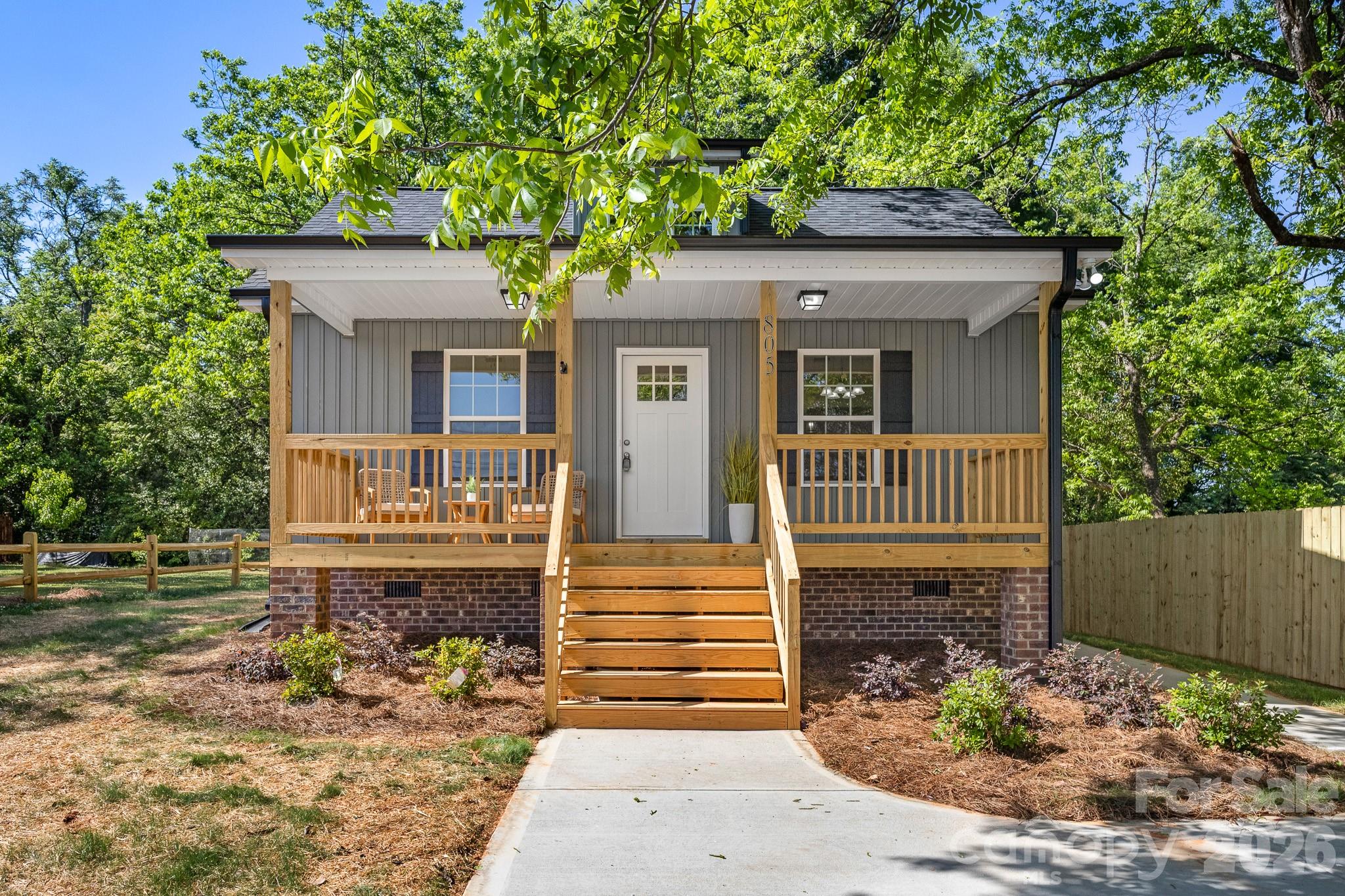 COMPLETED New Construction ready for you to make it your Home! The Charlotte is a cute 3 bed, 2 bath plan with features you will love! Enjoy your morning coffee or an evening sunset on the BIG covered front porch! From there, walk into the home onto NEW LVP Flooring throughout the entire home! Entertain easily in your spacious Great Room and Dining Area featuring a butler's cut-out into the kitchen and vaulted ceilings for that extra open feel! Kitchen is STUNNING with tons of counter space, white cabinets, granite countertops, and SS Dishwasher, Range, and Microwave! The Primary Suite offers a spacious room, modern ceiling fan, and full bathroom w/dual granite vanity & tub/shower combo. Both guest bedrooms are good sizes and share the additional full bathroom w/single granite vanity & tub/shower combo. GREAT price for this New Construction home and all it has to offer, come see it today!