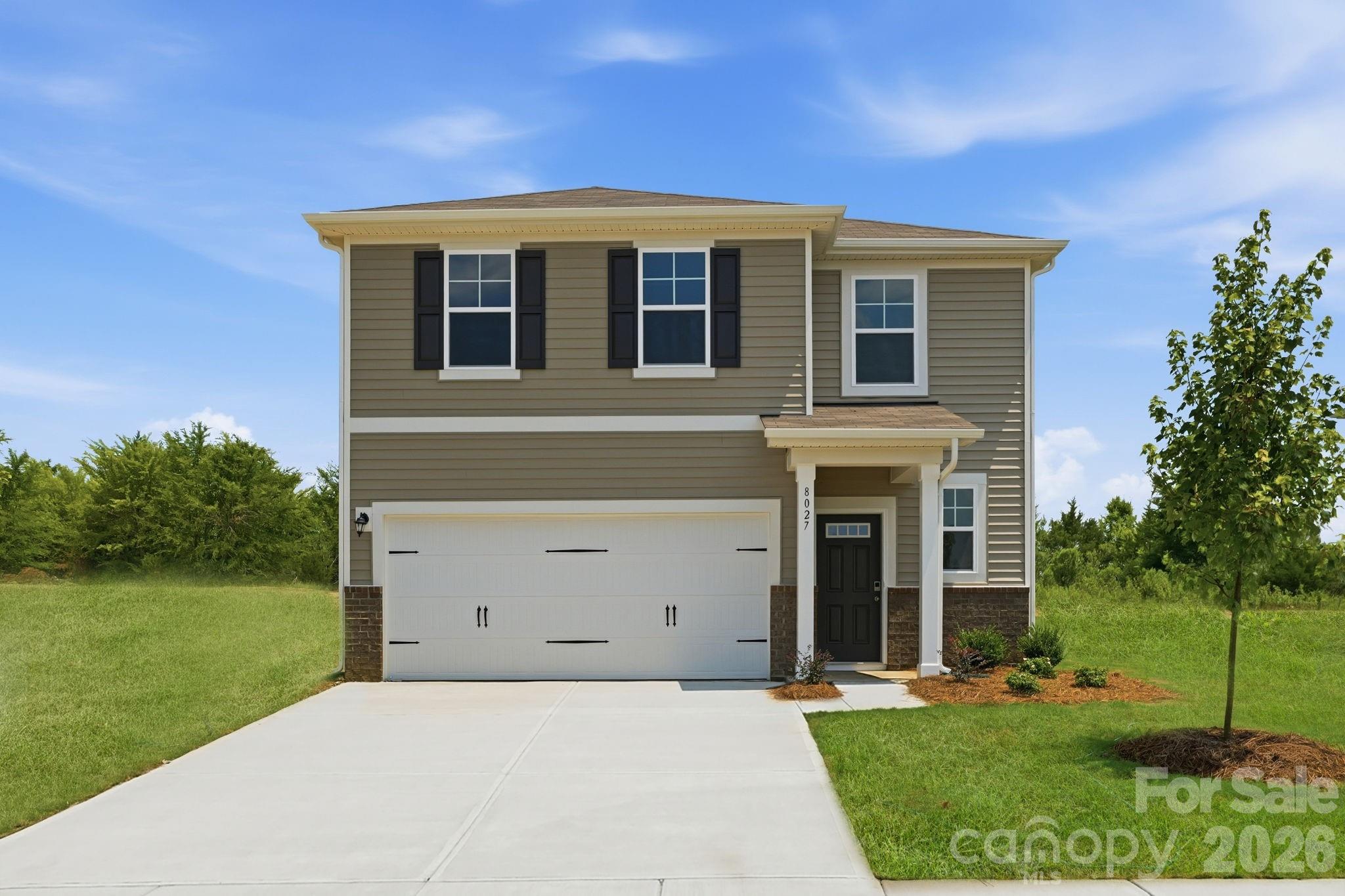 For modern style and comfortable, convenient design, choose the Hawthorn floor plan at Meadow Creek Village! The main level of this plan showcases an open layout featuring a kitchen with an island and walk-in pantry, a dining area, and a great room with a fireplace and patio access perfect for relaxing and entertaining. The primary suite sits toward the back of the home on the main level, boasting a walk-in closet and a private bath. Finishing out the main level is a convenient laundry room and half bathroom. Upstairs, you'll find comfortable living space in two secondary bedrooms that share a hall bathroom. Completing the home, a large loft on the second floor offers versatile hangout space.